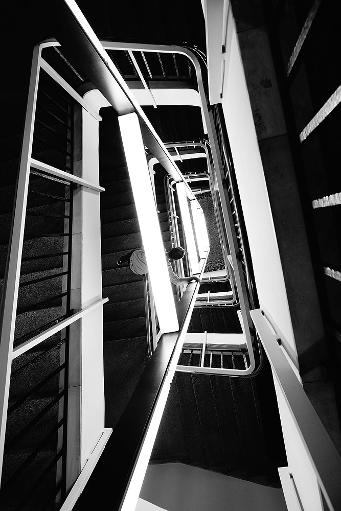 Sony Alpha NEX-7 sample photo. The man in the stairwell photography