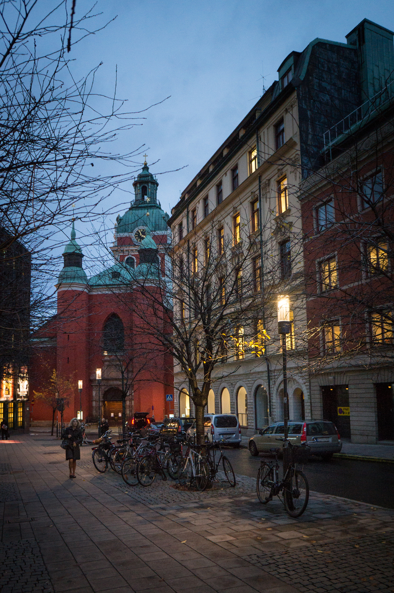 Sony Alpha NEX-F3 + Sony E 16mm F2.8 sample photo. Bycicles near the church in stockholm photography