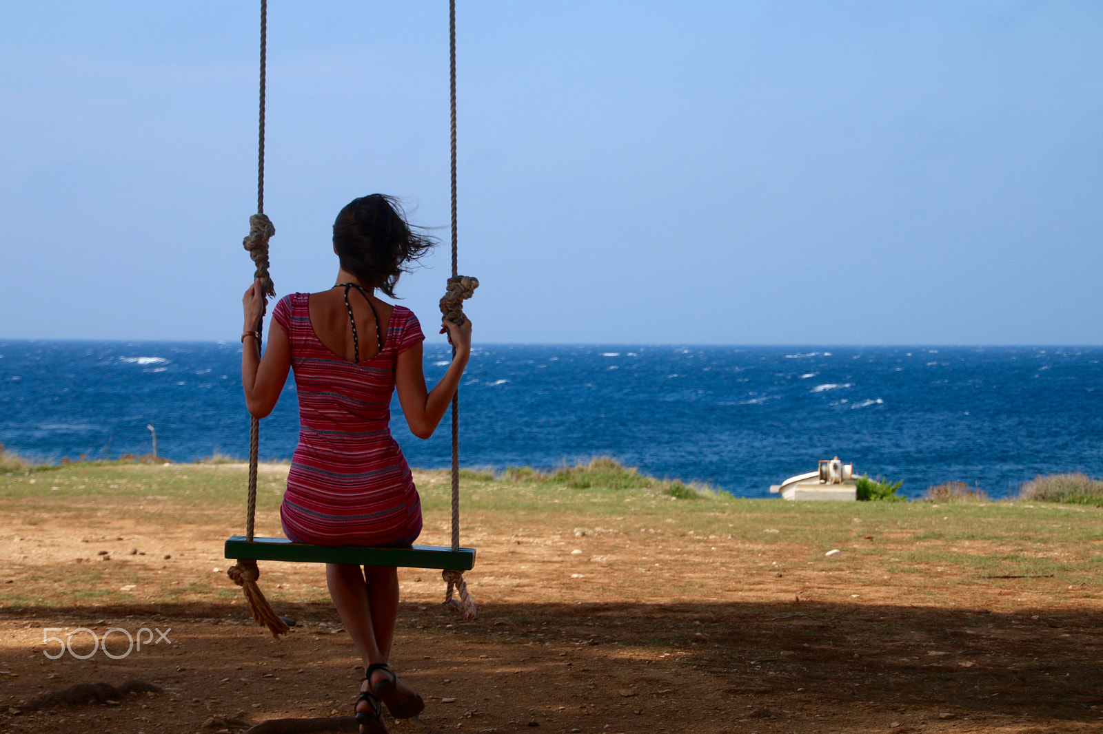 Sigma 18-125mm F3.8-5.6 DC OS HSM sample photo. Girl, swing, sea photography