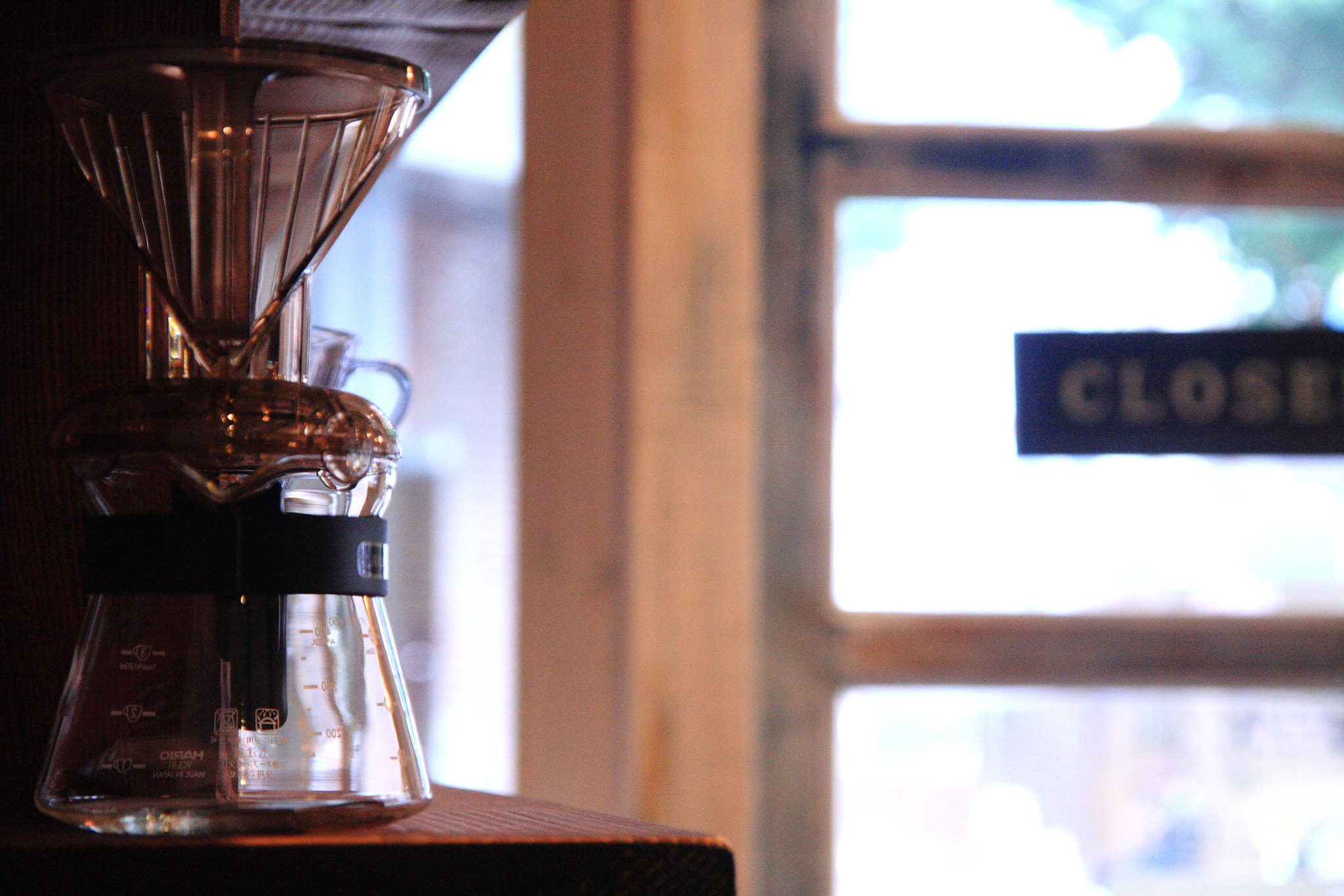 Sigma 17-70mm F2.8-4 DC Macro OS HSM sample photo. Cafe photography