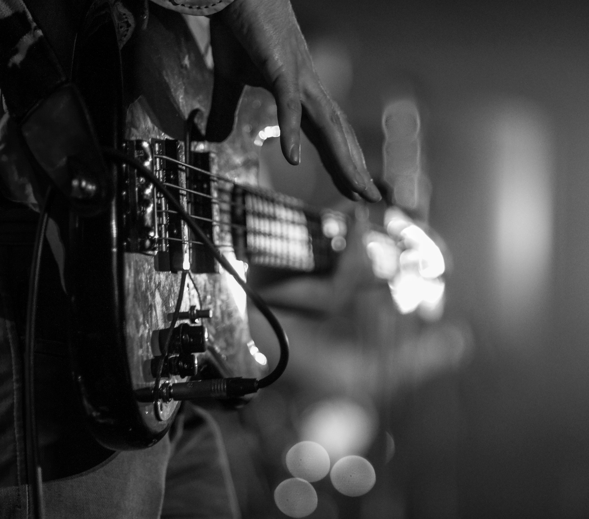 85mm F1.4 sample photo. Bass guitar  black and white photography