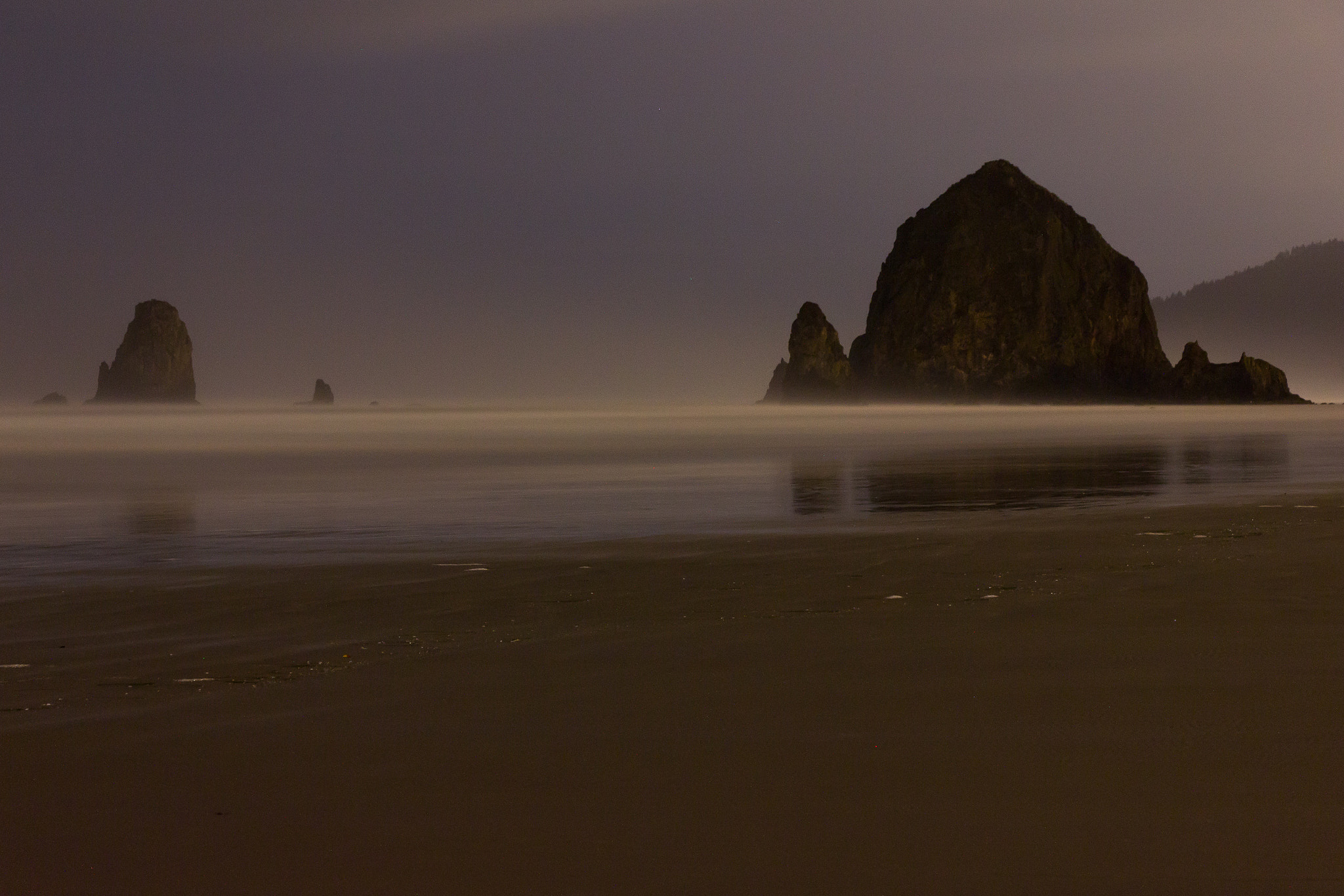 Canon EF-S 18-135mm F3.5-5.6 IS STM sample photo. Haystack rock at first light photography
