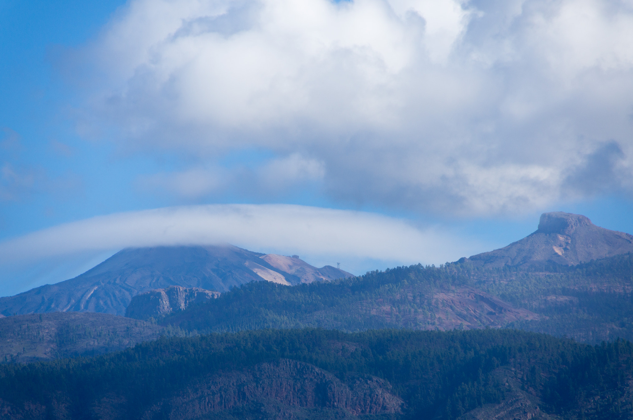 Sony SLT-A55 (SLT-A55V) + Sigma 18-250mm F3.5-6.3 DC OS HSM sample photo. Clouds and volcano photography