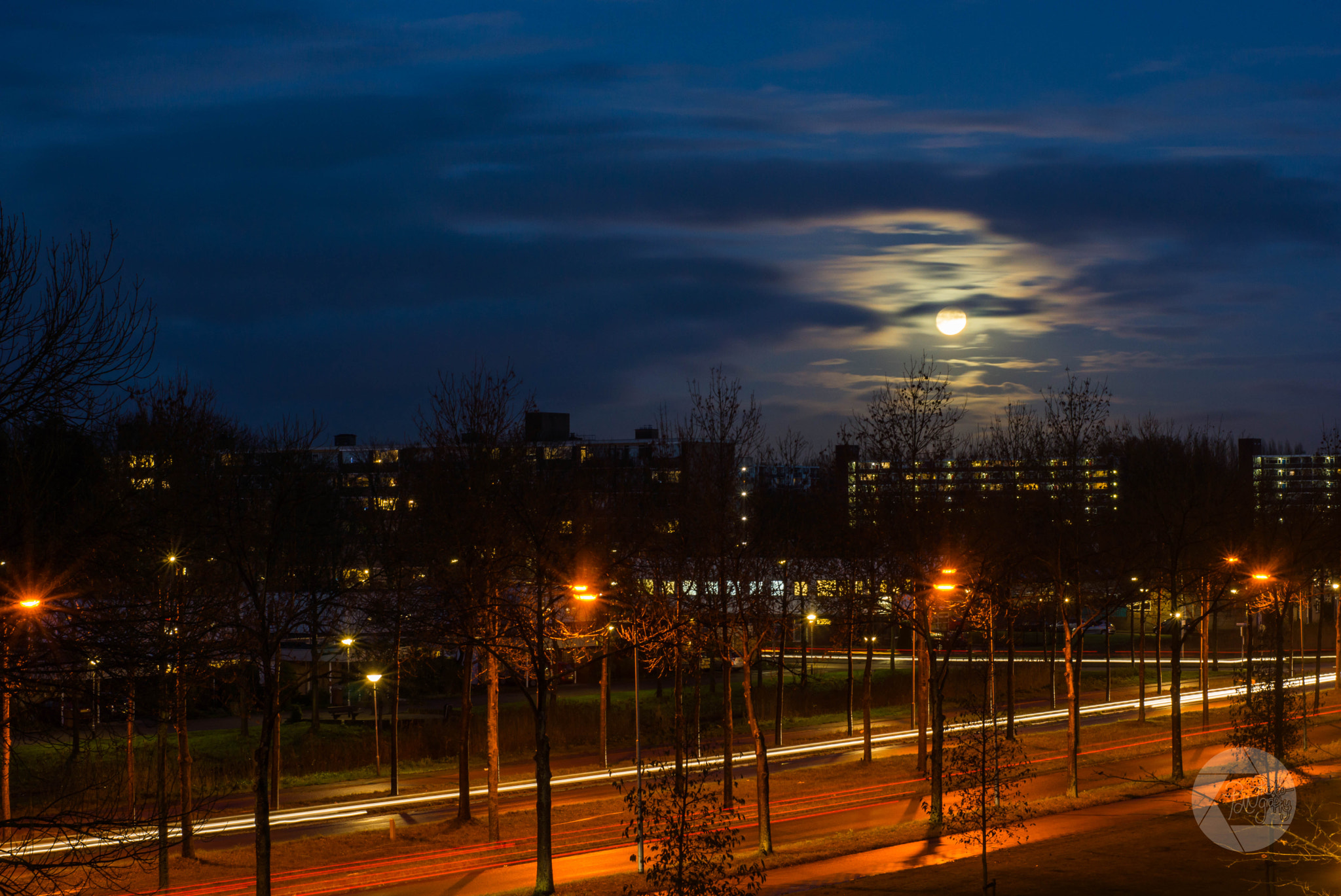 Sony SLT-A77 + Sony 50mm F1.4 sample photo. Moon in the clouds photography