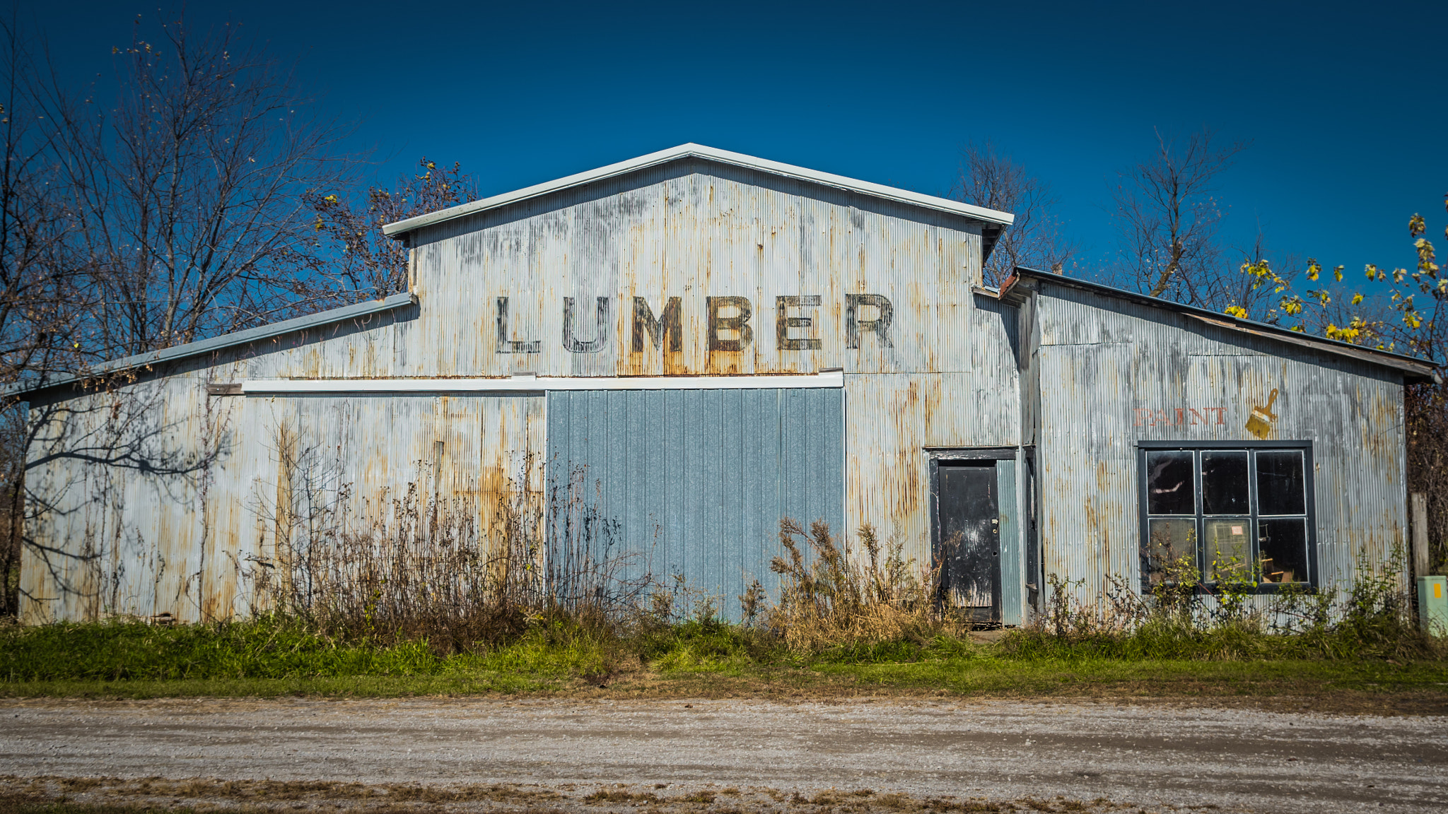 smc PENTAX-DA L 18-55mm F3.5-5.6 sample photo. Lumber building photography