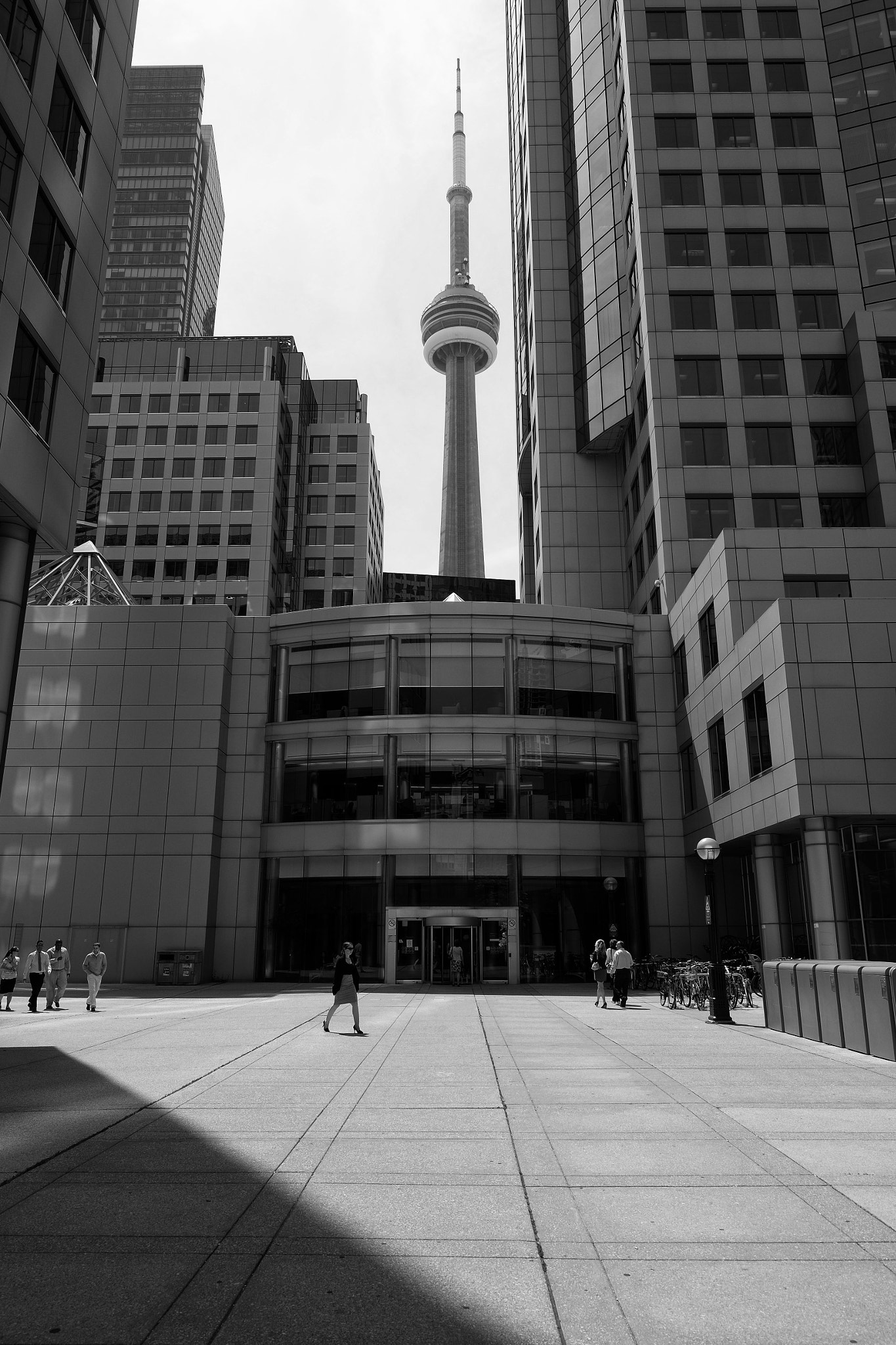 Fujifilm X-E1 + Fujifilm XF 16mm F1.4 R WR sample photo. Cn tower through the buildings photography