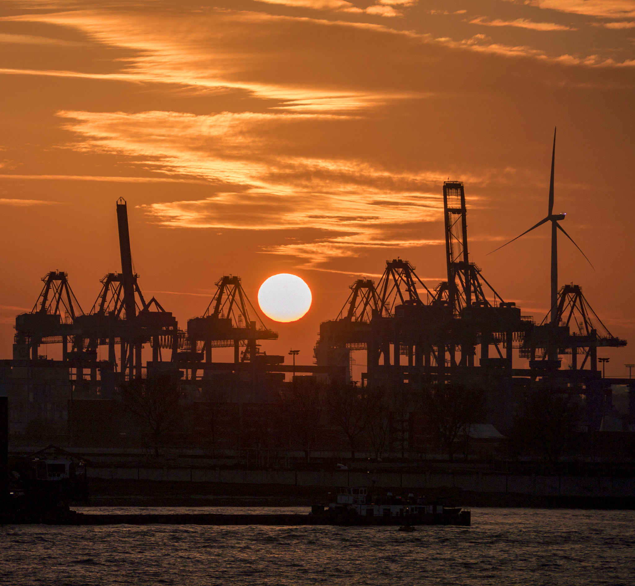Panasonic Lumix G Vario 45-200mm F4-5.6 OIS sample photo. Crane cradled sunset photography