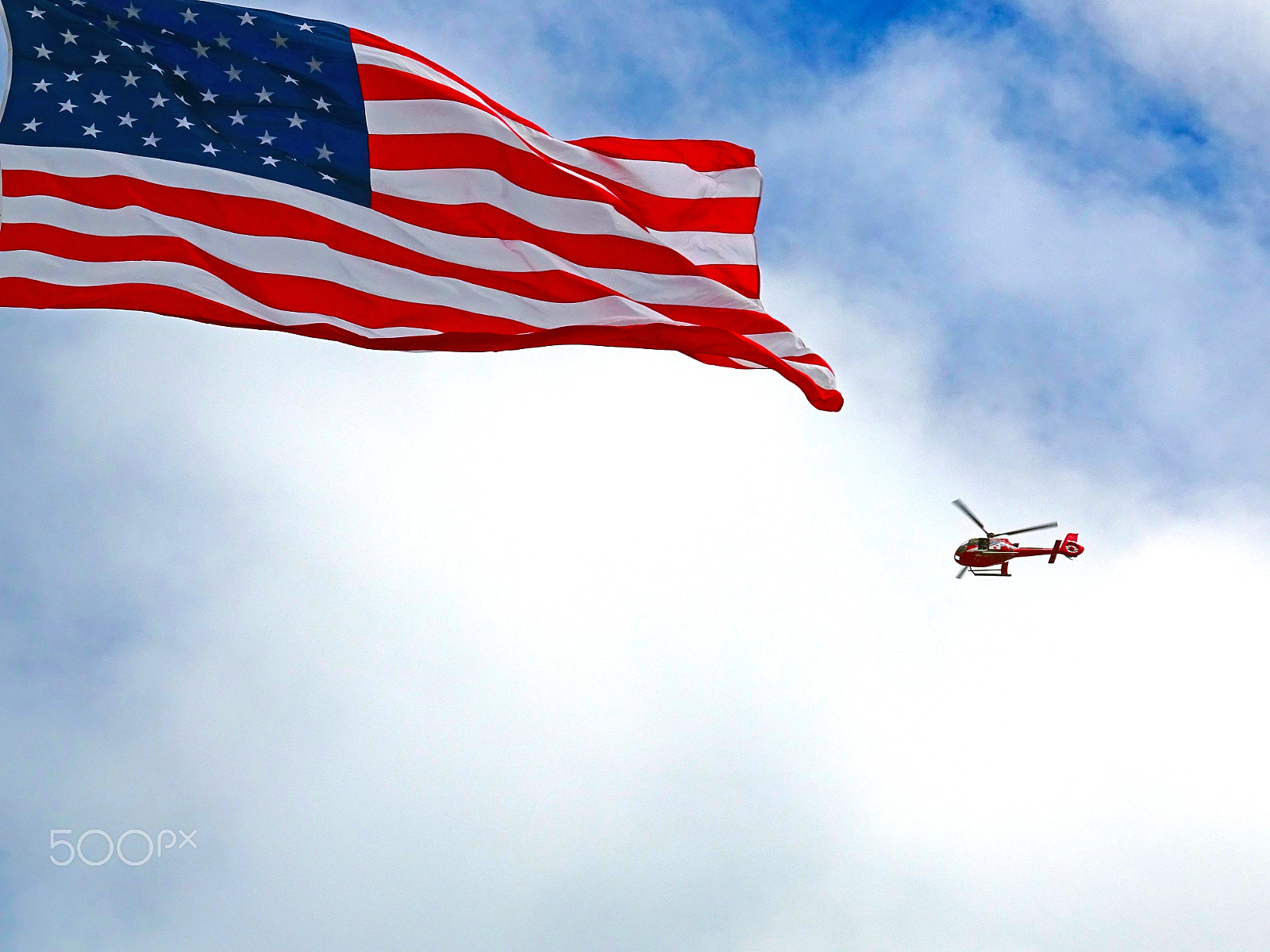 Sony Cyber-shot DSC-WX350 + Sony 25-500mm F3.5-6.5 sample photo. __flag usa and helicopter__ photography
