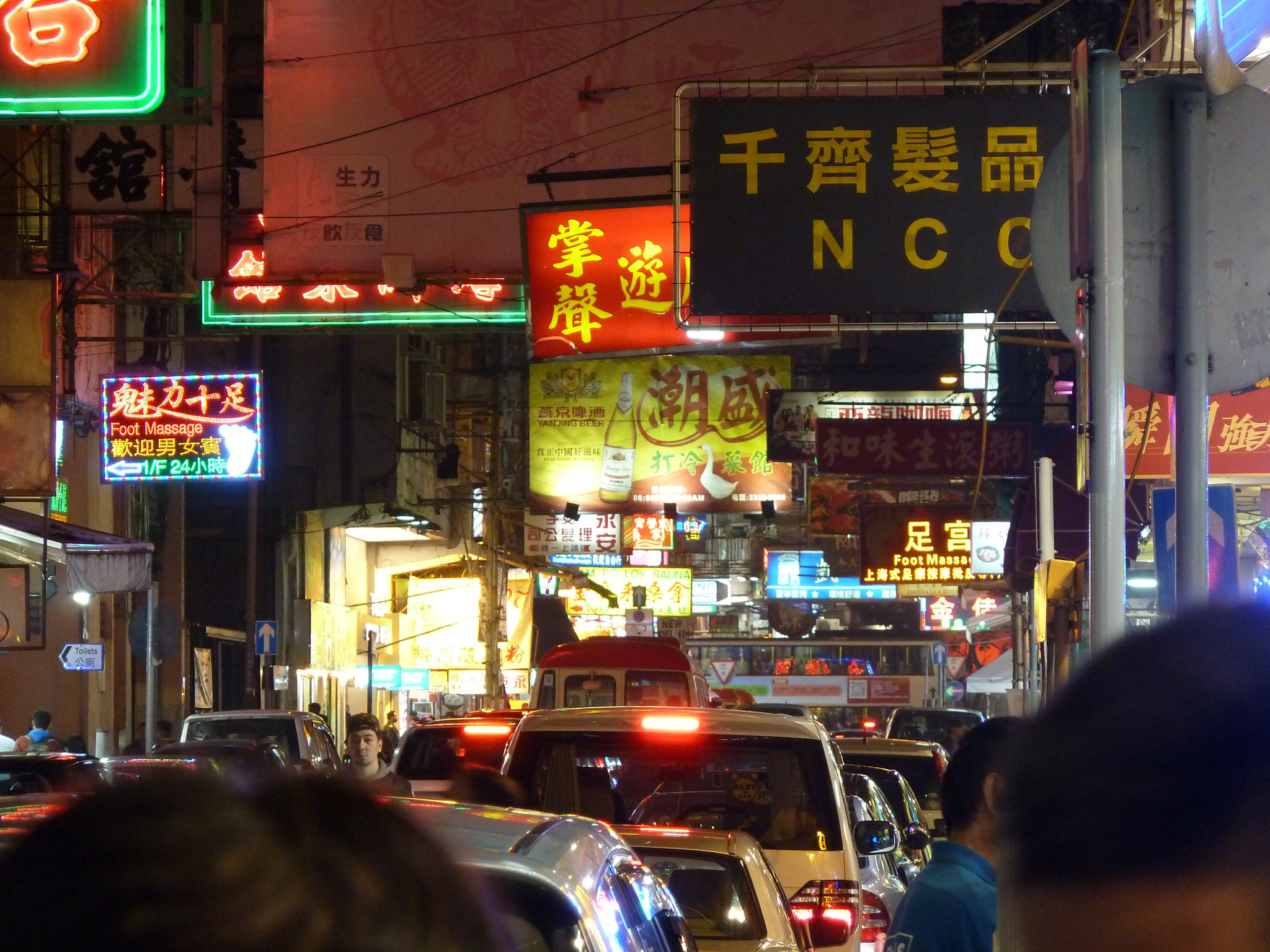 Panasonic DMC-ZS6 sample photo. Busy street at night photography