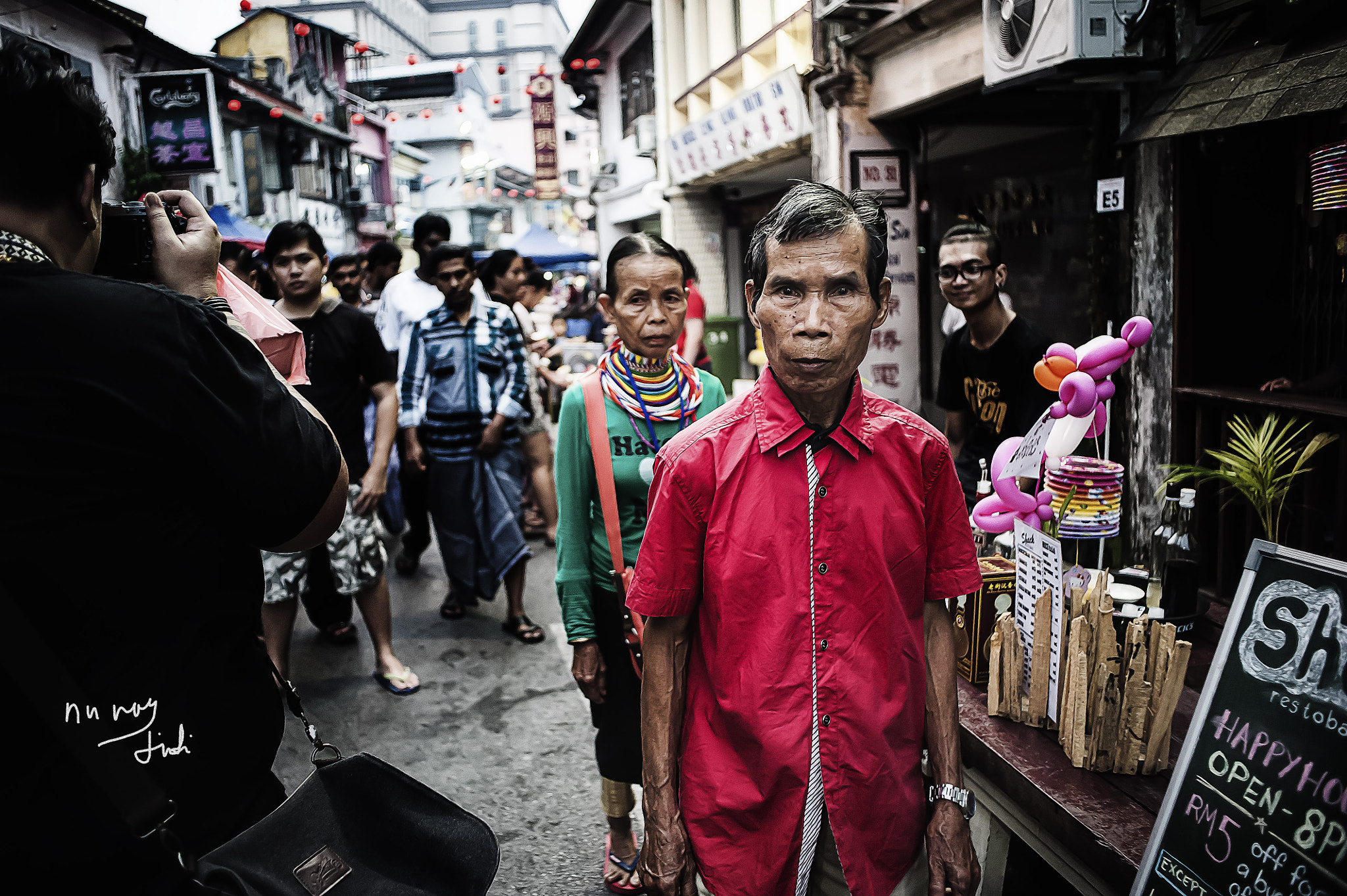 Nikon D700 + AF Nikkor 28mm f/2.8 sample photo. The ring lady with her guardian angel.jpg photography