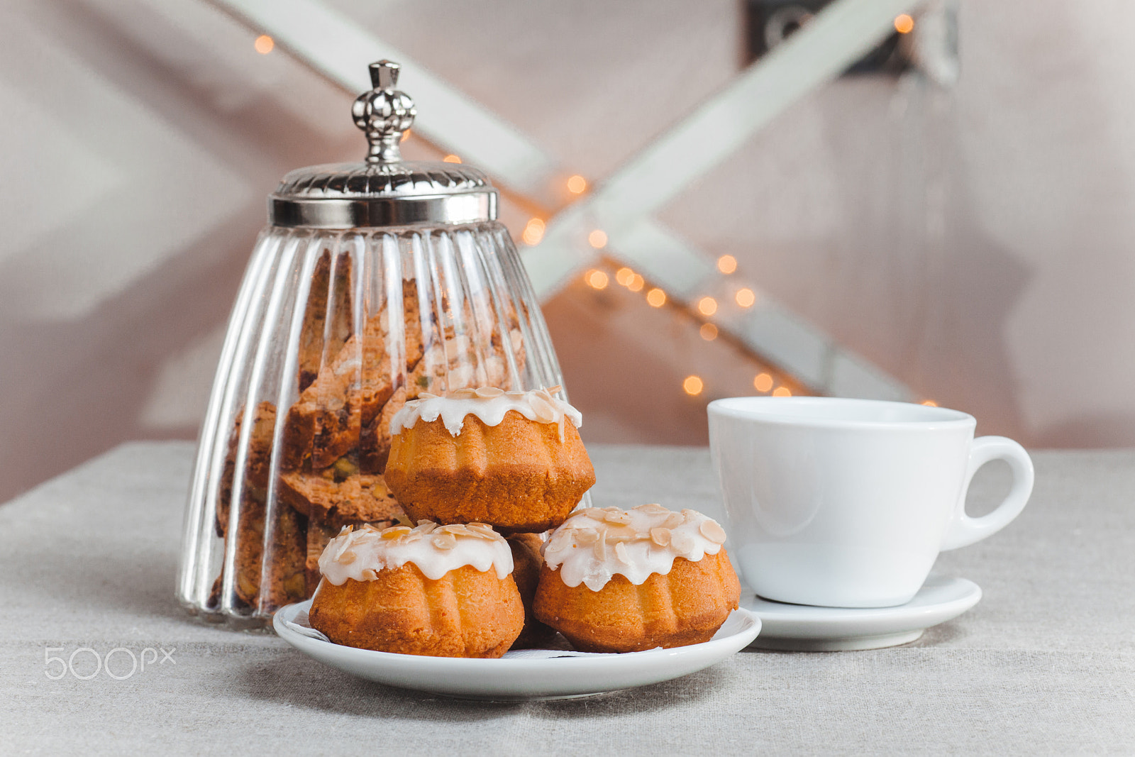 Canon EF 100mm F2.8 Macro USM sample photo. Composition on the table with cup of coffee and three cupcake in glaze light background photography