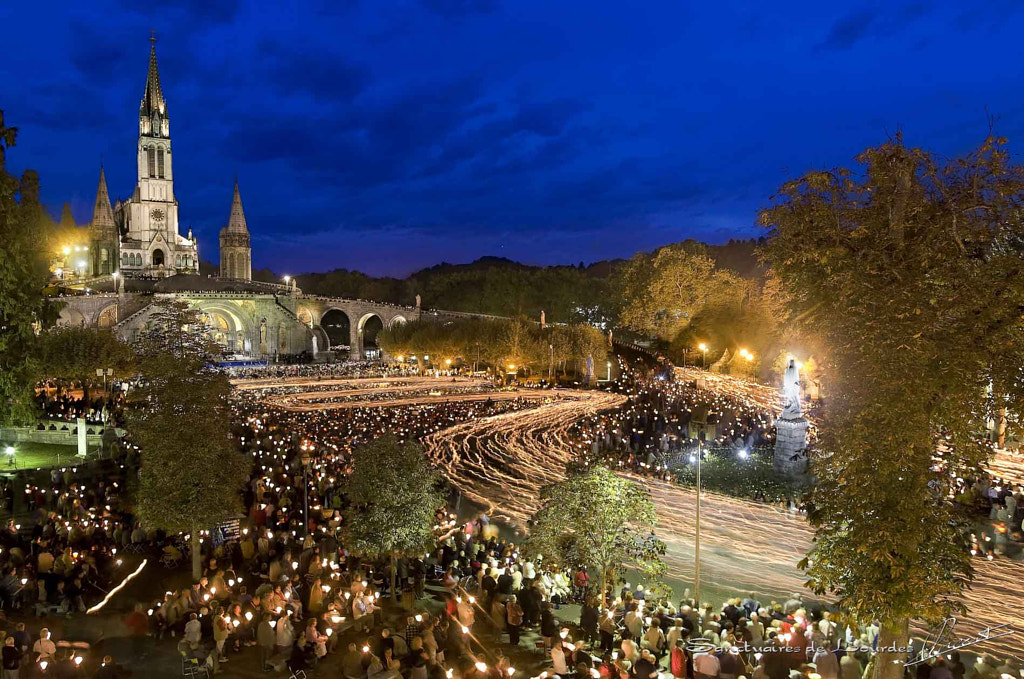 Torchlight procession in Lourdes by pierre vincent / 500px