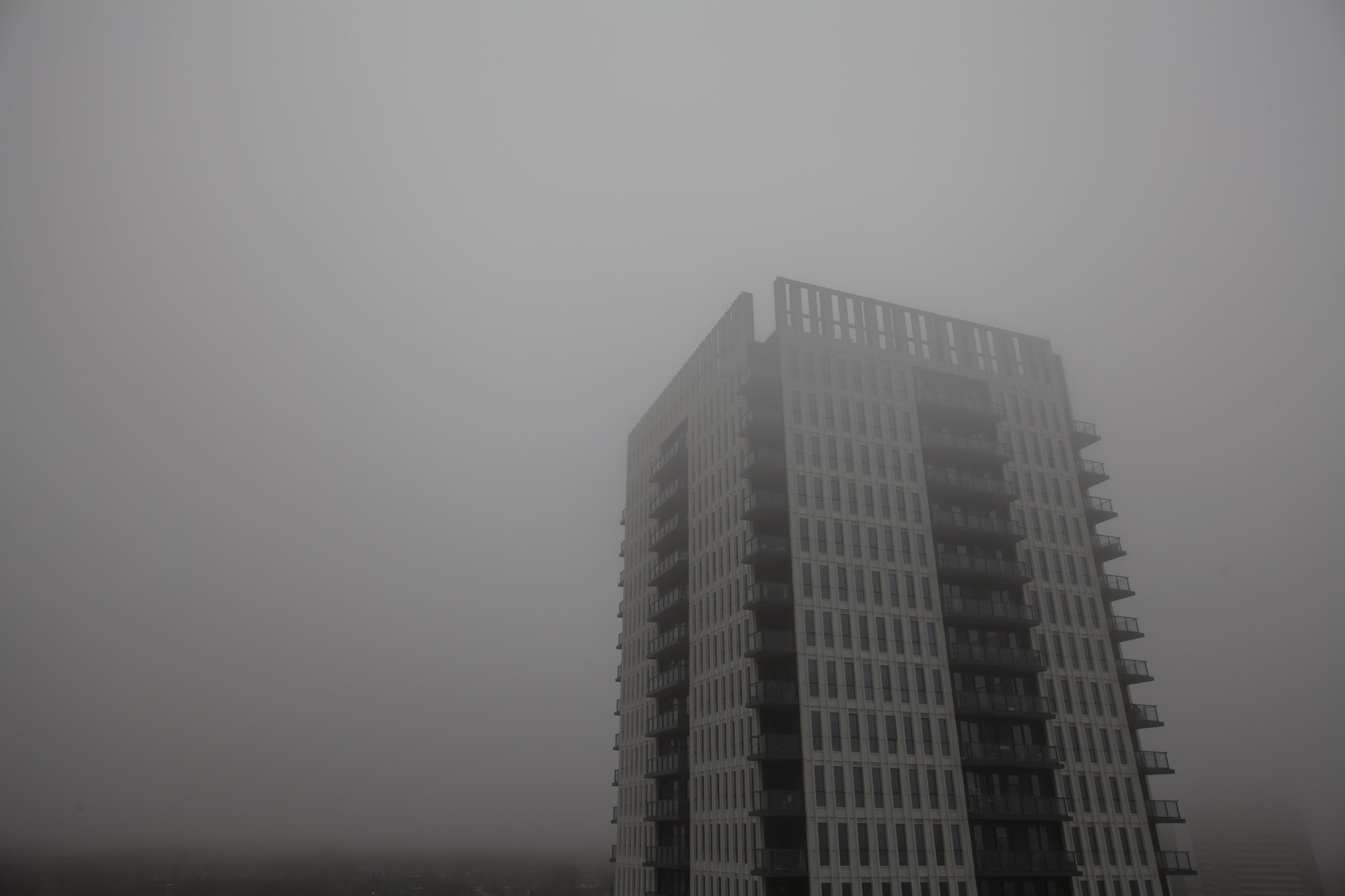 Canon EF 11-24mm F4L USM sample photo. Building in the haze photography