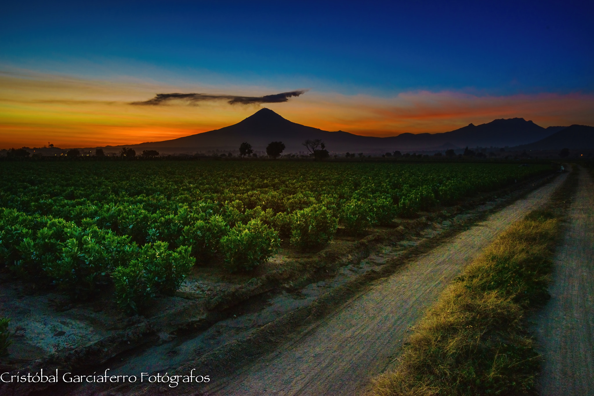 Sony a7R + Canon EF 16-35mm F2.8L USM sample photo. Sunset with the volcanoes photography