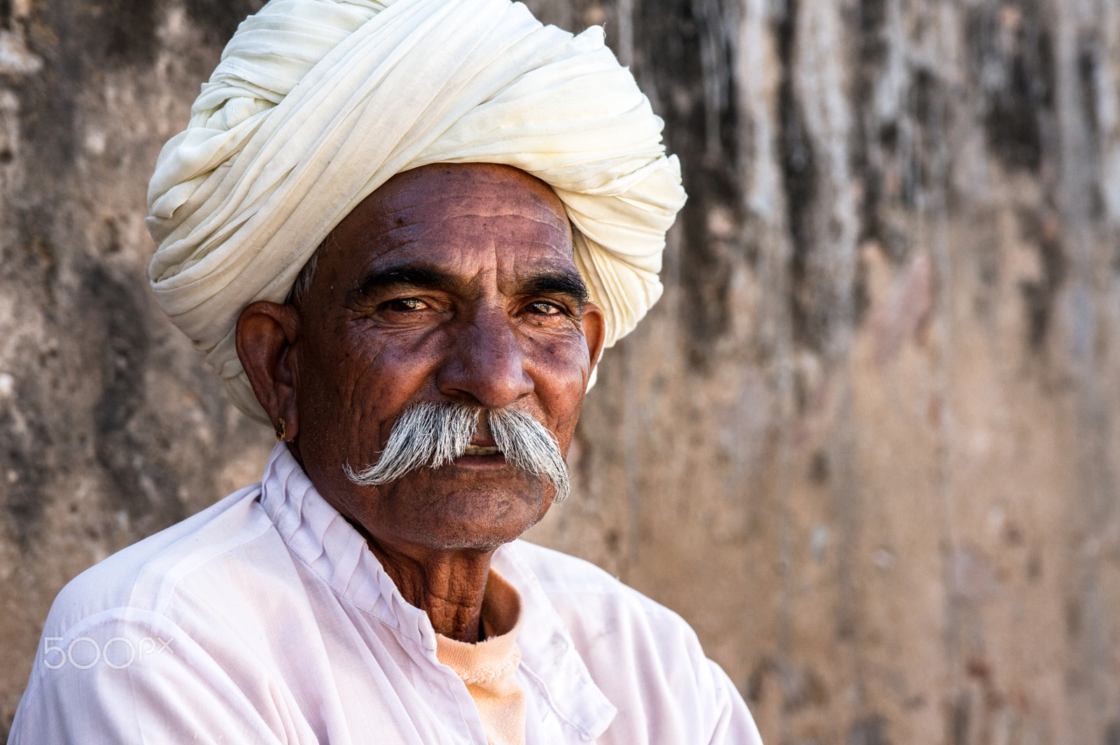 Sony Alpha DSLR-A550 sample photo. Man in little village near pushkar photography