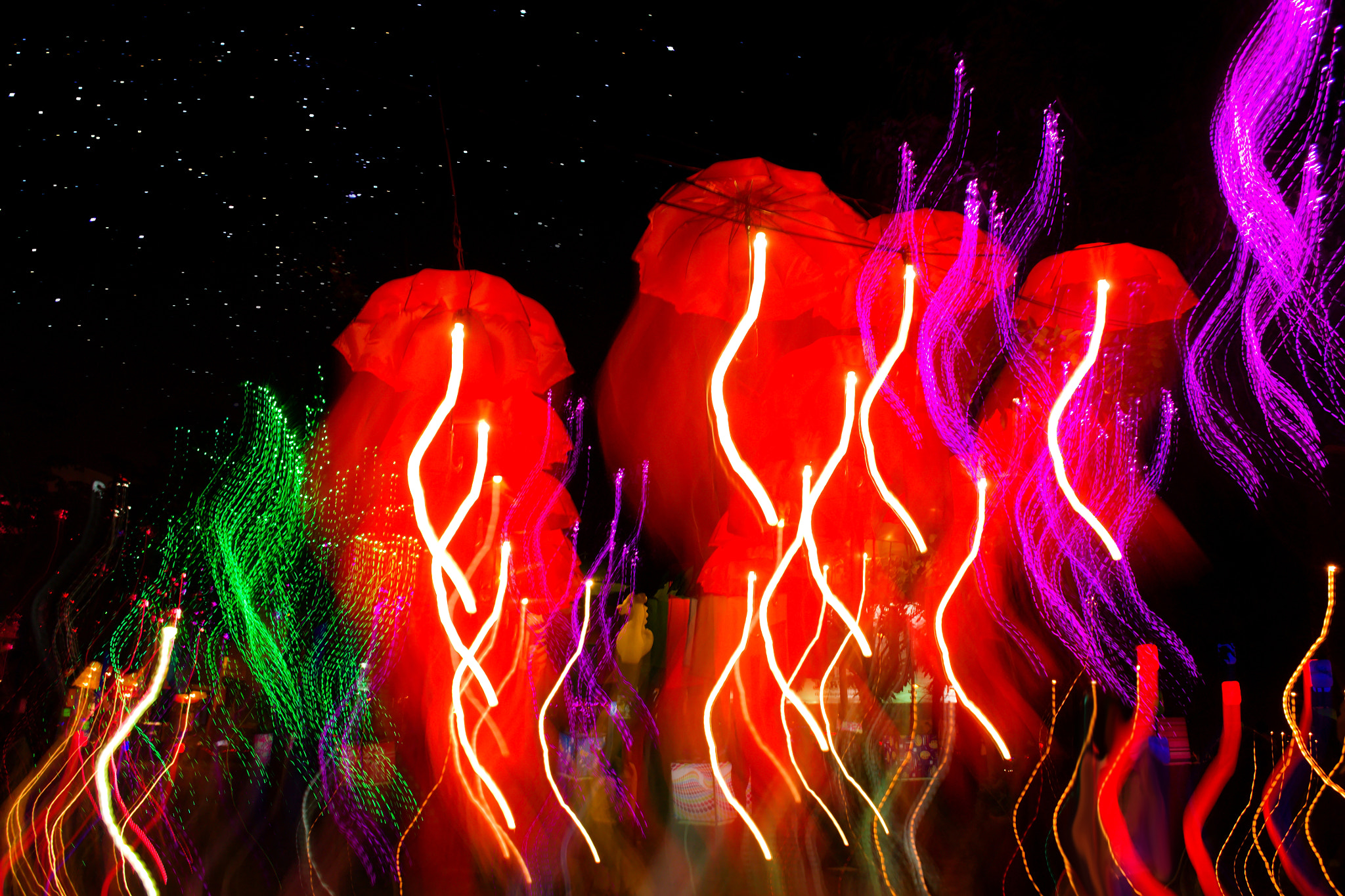 18.00 - 55.00 mm f/3.5 - 5.6 sample photo. Speed of umbrellas neon light photography