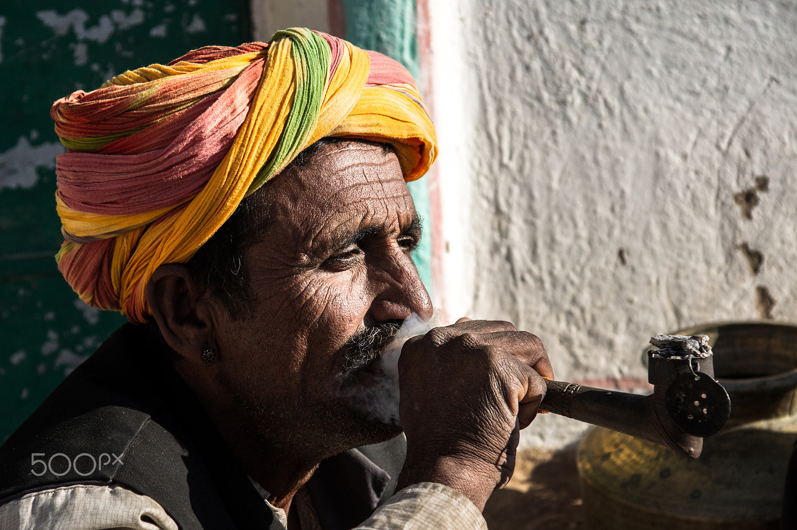 Sony Alpha DSLR-A550 sample photo. Old man smoking pipe photography