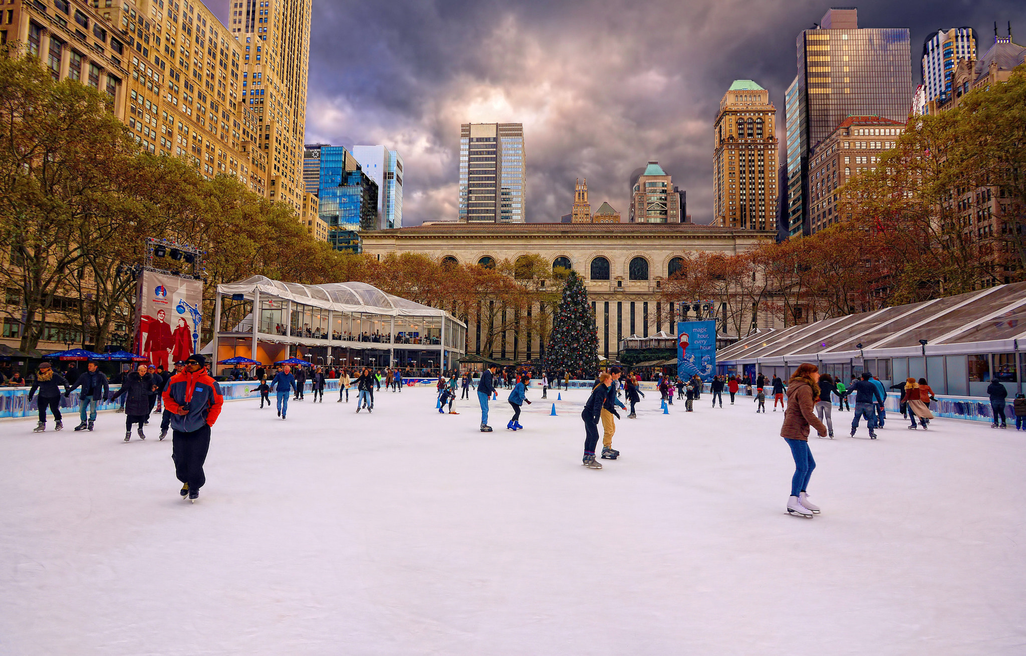 Nikon D600 + AF Zoom-Nikkor 28-70mm f/3.5-4.5D sample photo. Bryant park ice skating nyc photography