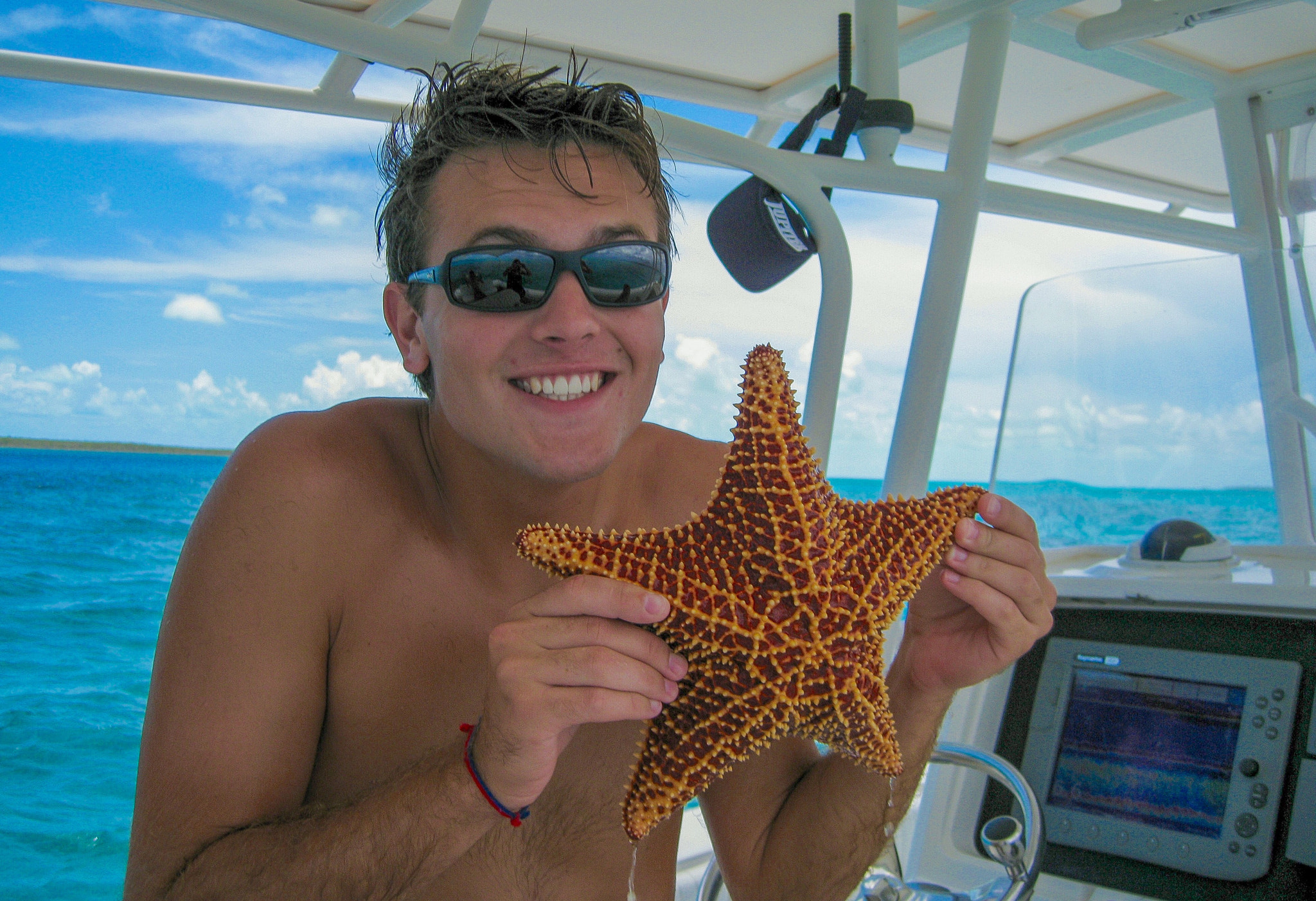 Canon POWERSHOT SD950 IS sample photo. Chad too happy about a starfish in great exuma bahamas photography
