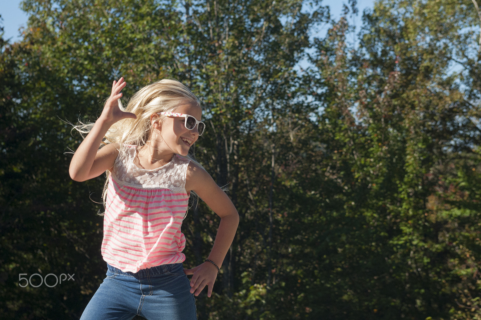 Nikon D300 + AF Zoom-Nikkor 35-70mm f/2.8D sample photo. Girl jumping photography