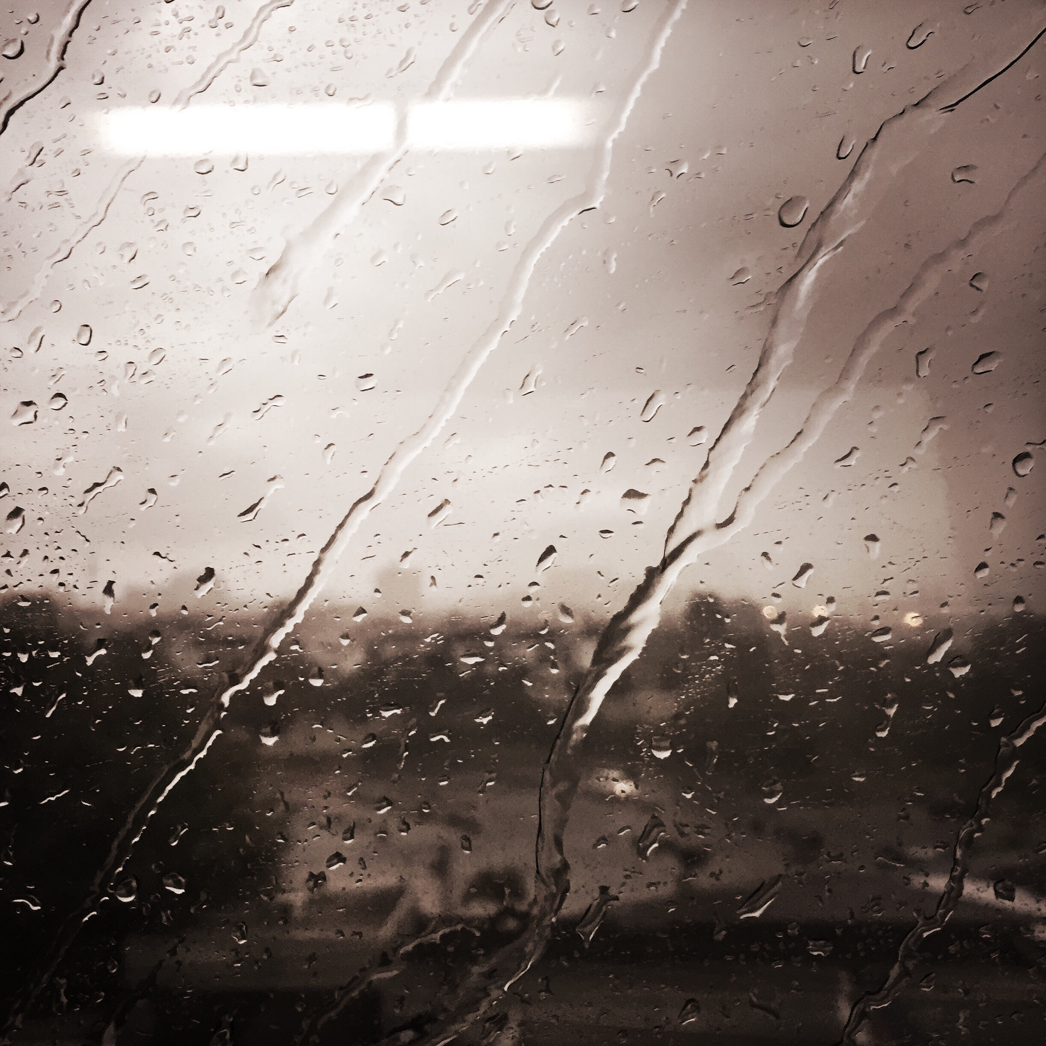 Hipstamatic 304 sample photo. Rain gliding car window photography