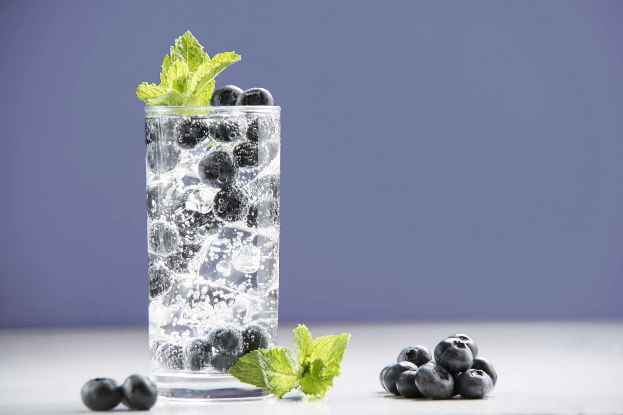 Nikon D810 + Sigma 70-200mm F2.8 EX DG OS HSM sample photo. Sparkling water with blueberries photography