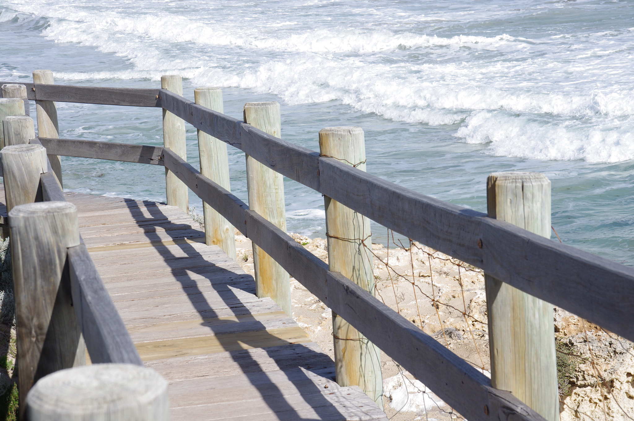 Pentax K-x + Sigma DL-II 35-80mm F4-5.6 sample photo. Beach walkway photography