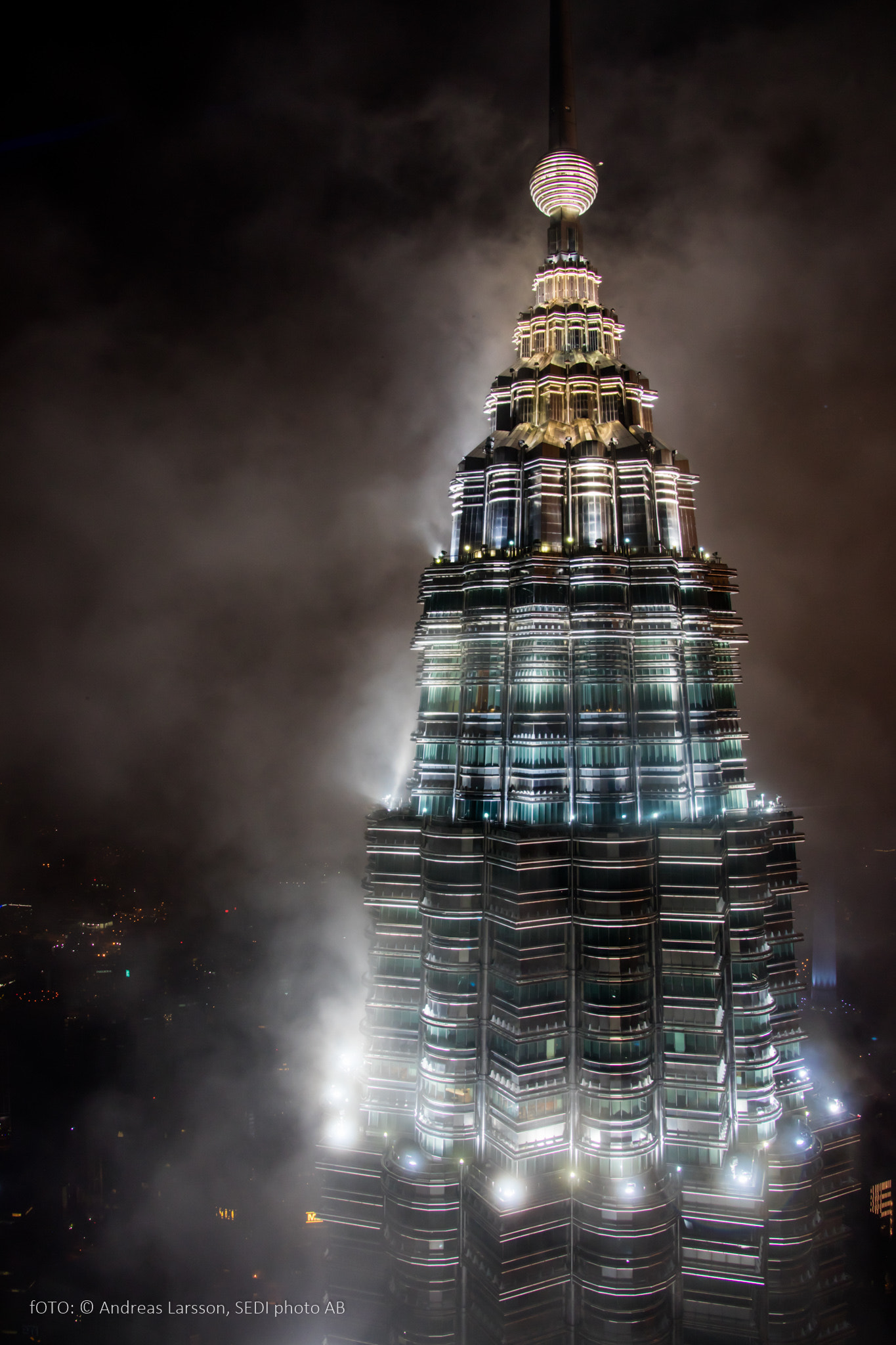 Canon EF 28-300mm F3.5-5.6L IS USM sample photo. Twin tower in mist photography