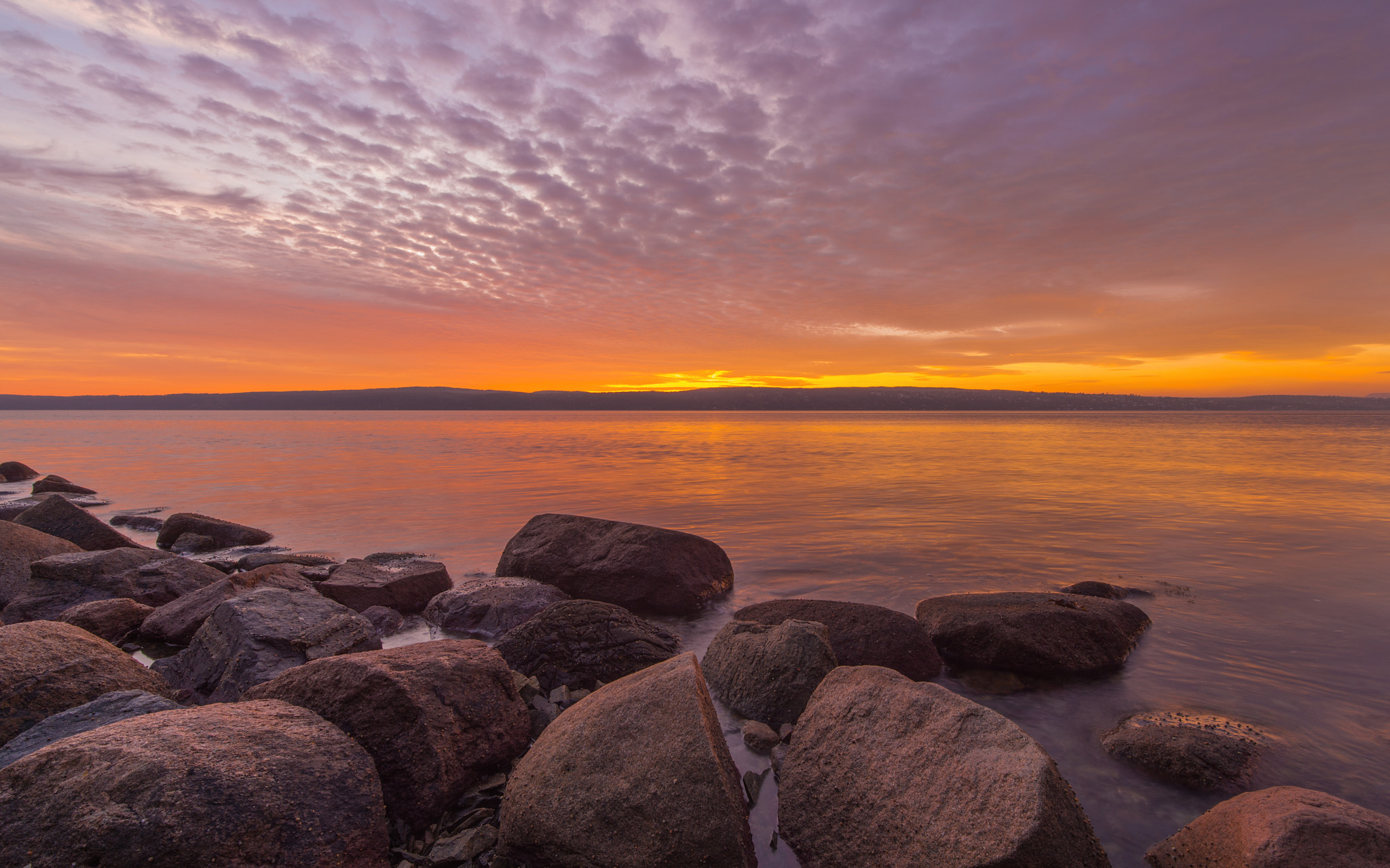 Nikon D4S + ZEISS Distagon T* 15mm F2.8 sample photo. Sunset over mystery rocks photography
