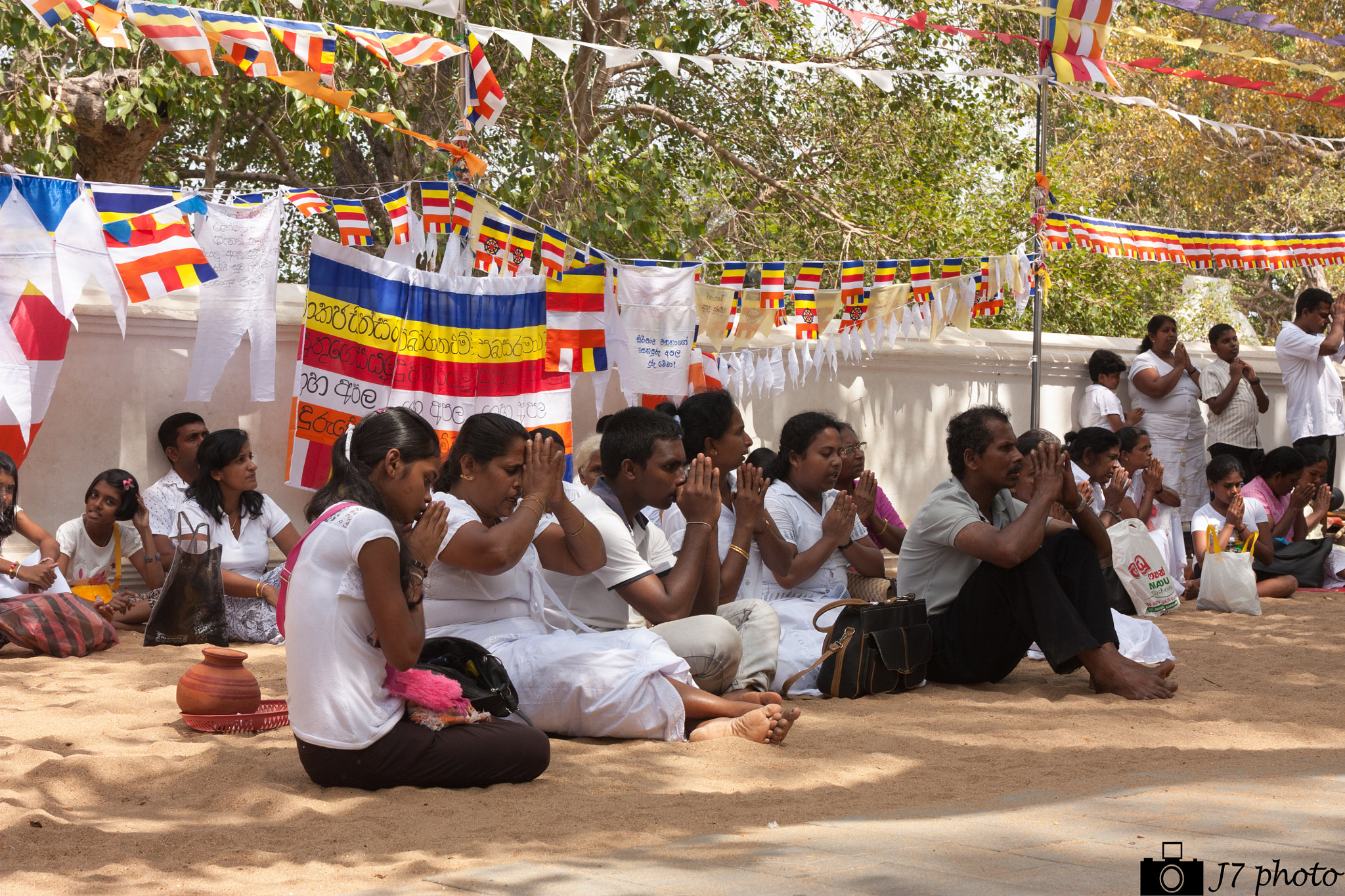 Canon EF 24-70mm F4L IS USM sample photo. People praying photography