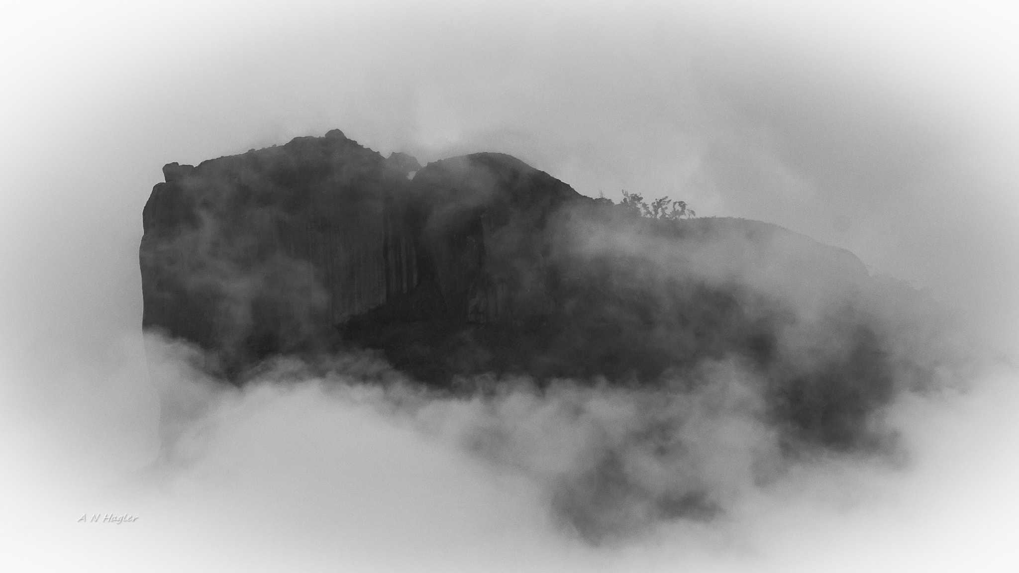 Sony 70-300mm F4.5-5.6 G SSM sample photo. Pedra da gavea west face in clouds photography