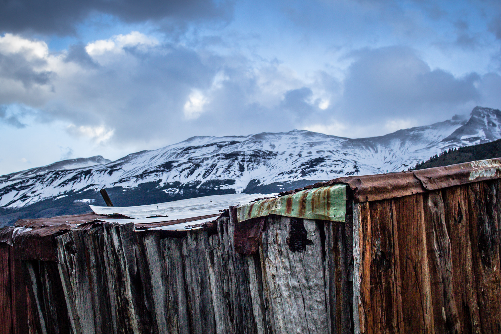 Sigma 30mm F1.4 EX DC HSM sample photo. Wood textures and mountain photography