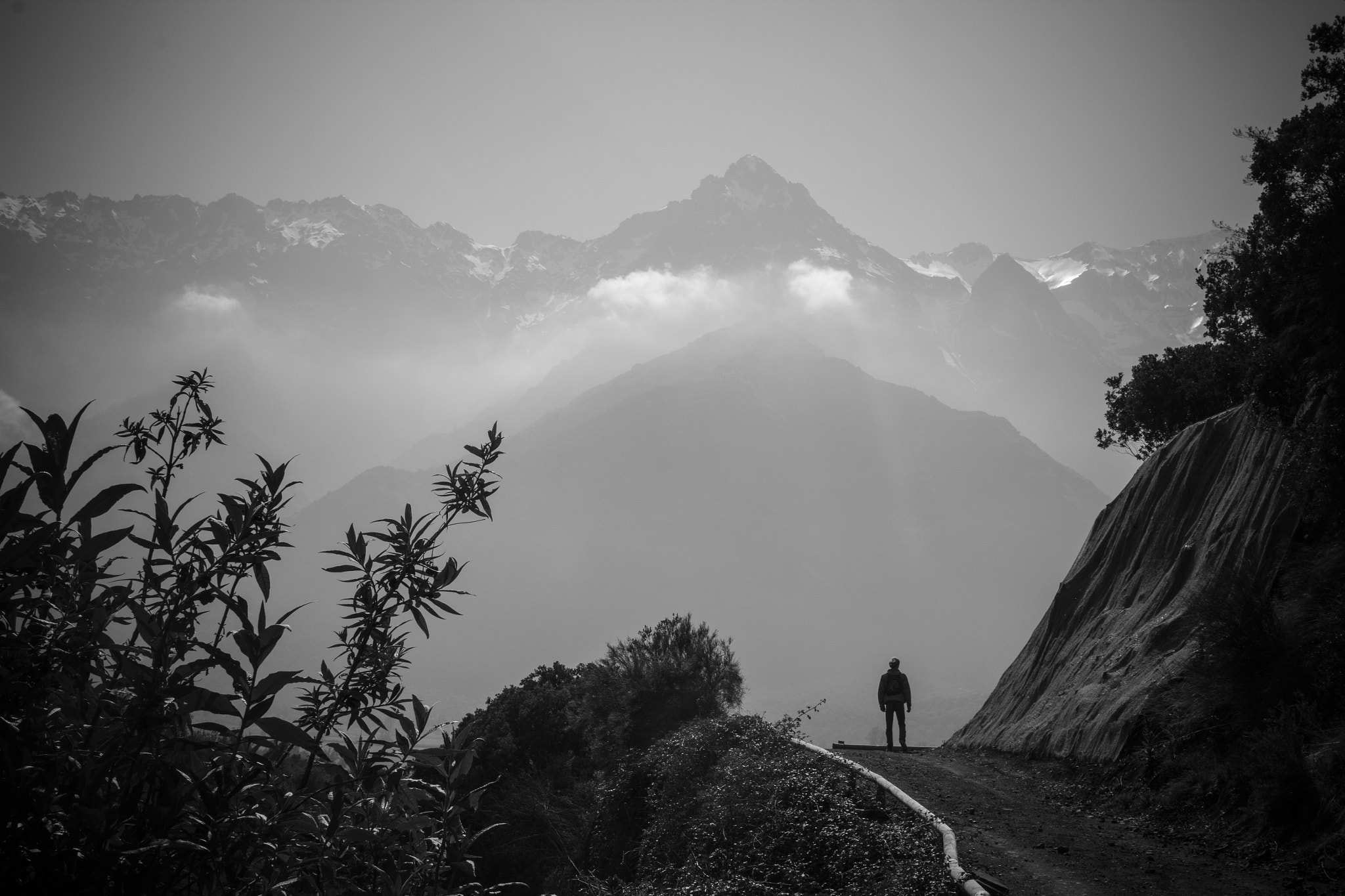 Sigma 30mm F1.4 EX DC HSM sample photo. Lone man on a road in the mountains photography