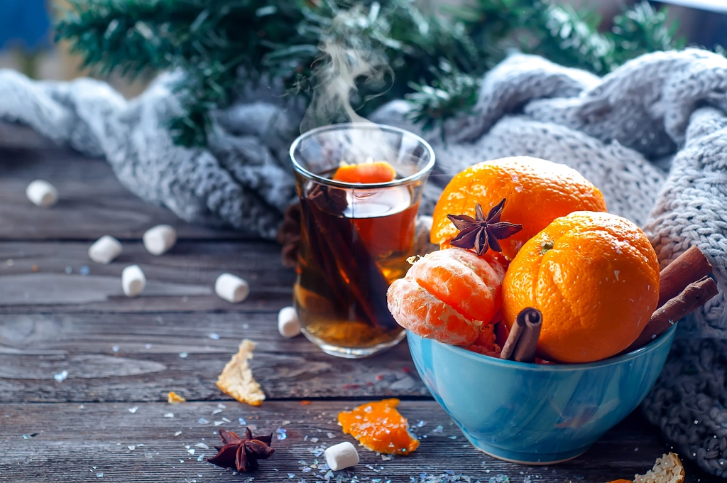 Tangerine in scarf over wooden background by Yuliia Mazurkevych on 500px.com