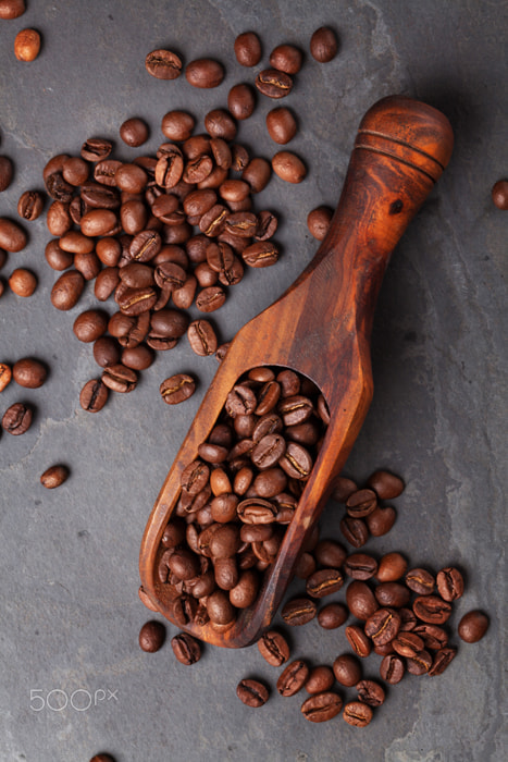Coffee beans on stone table