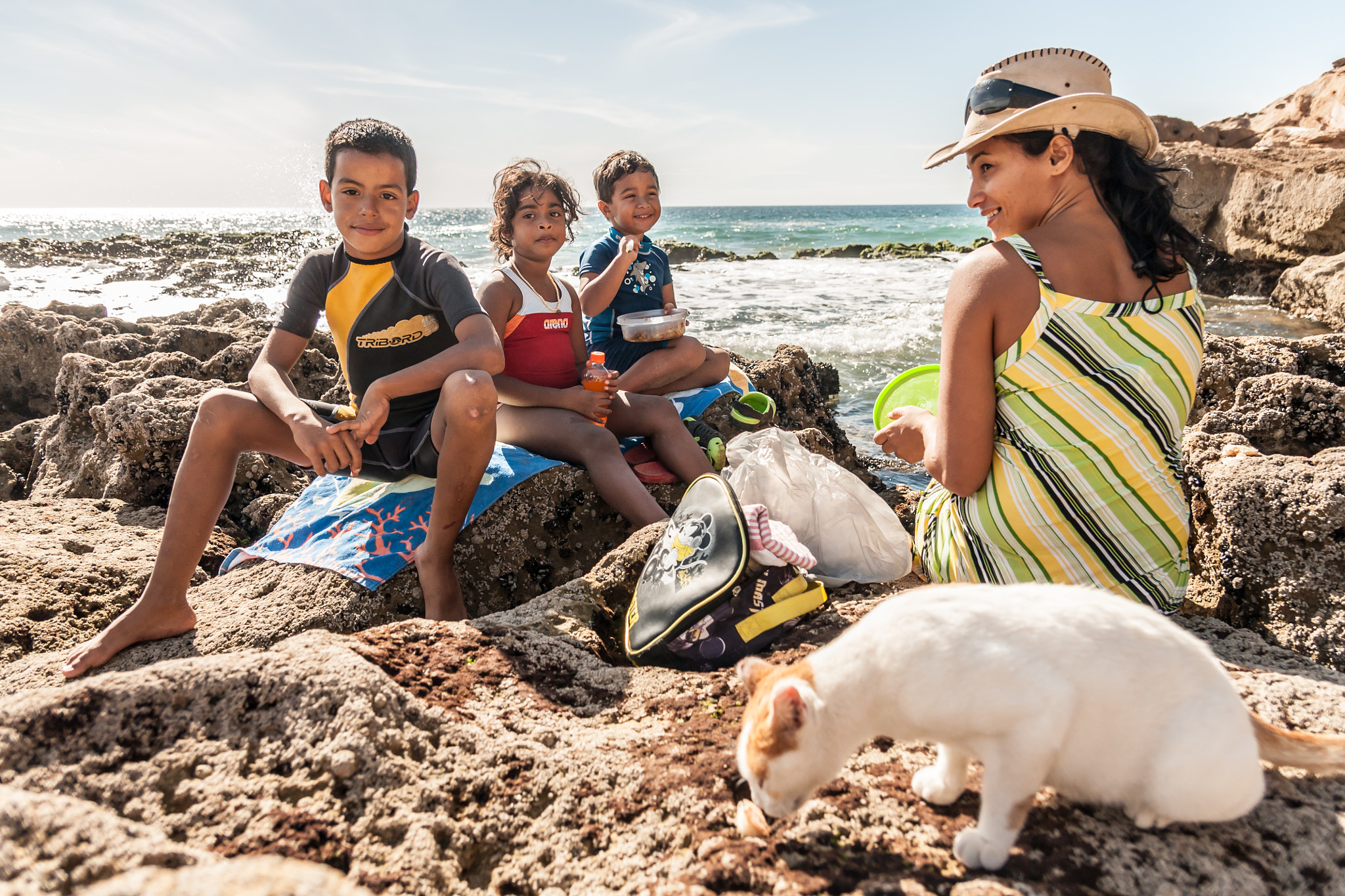 Sony Alpha DSLR-A700 + 17-50mm F2.8 sample photo. Moroccon family by the coast photography