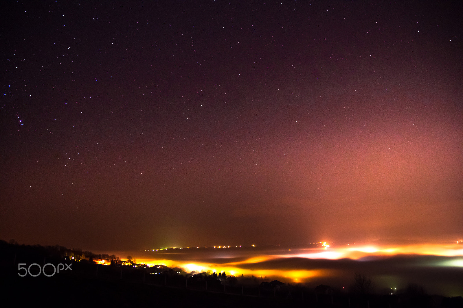 Sony Alpha DSLR-A500 sample photo. Fog over the city - sky photography