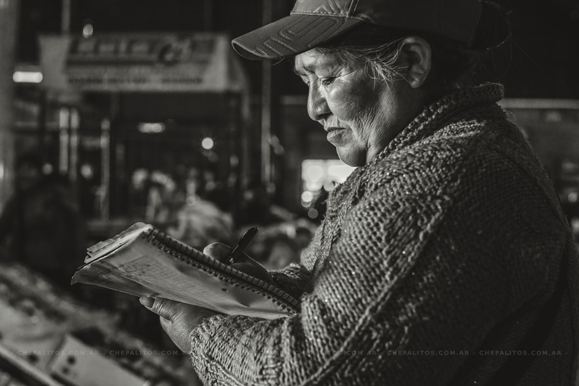 Sony a7 + E 50mm F2 sample photo. Market woman photography