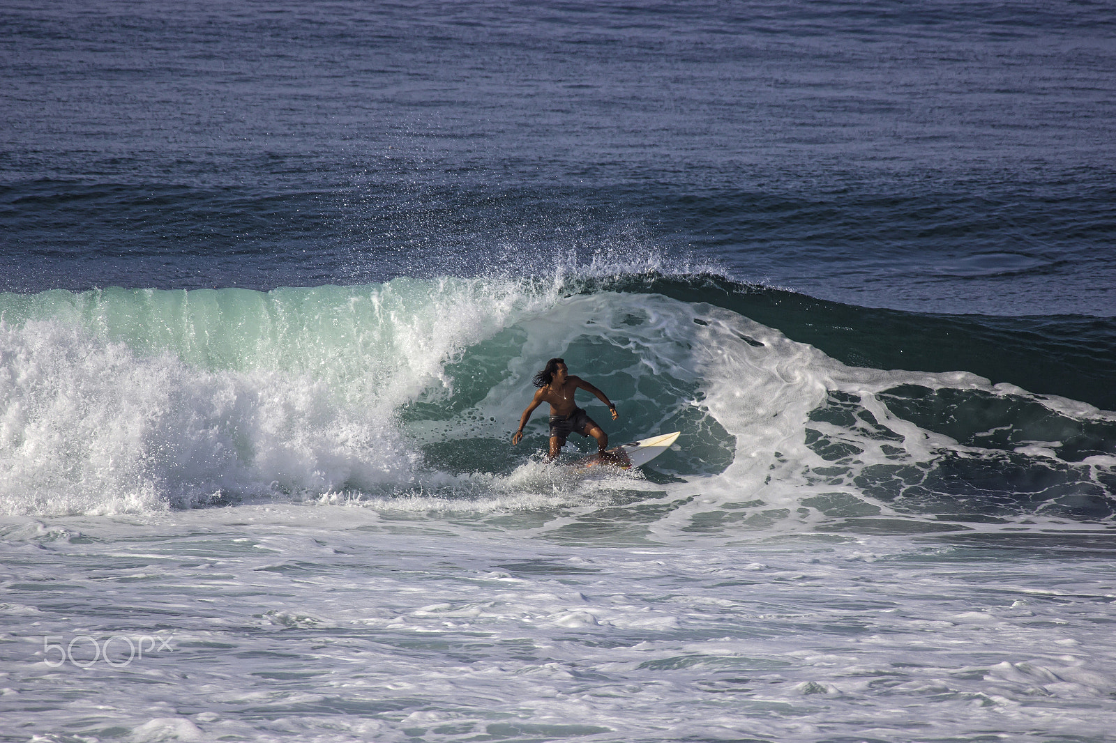 Canon EOS 600D (Rebel EOS T3i / EOS Kiss X5) + Canon EF 100-300mm f/5.6 sample photo. Surfer in canggu, echo beach, bali photography