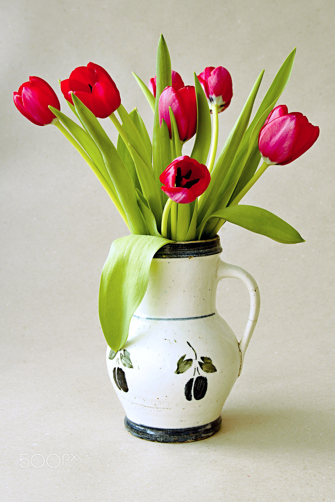 Canon EOS 60D + Canon EF 28-105mm f/3.5-4.5 USM sample photo. Red tulips in the old pitcher photography