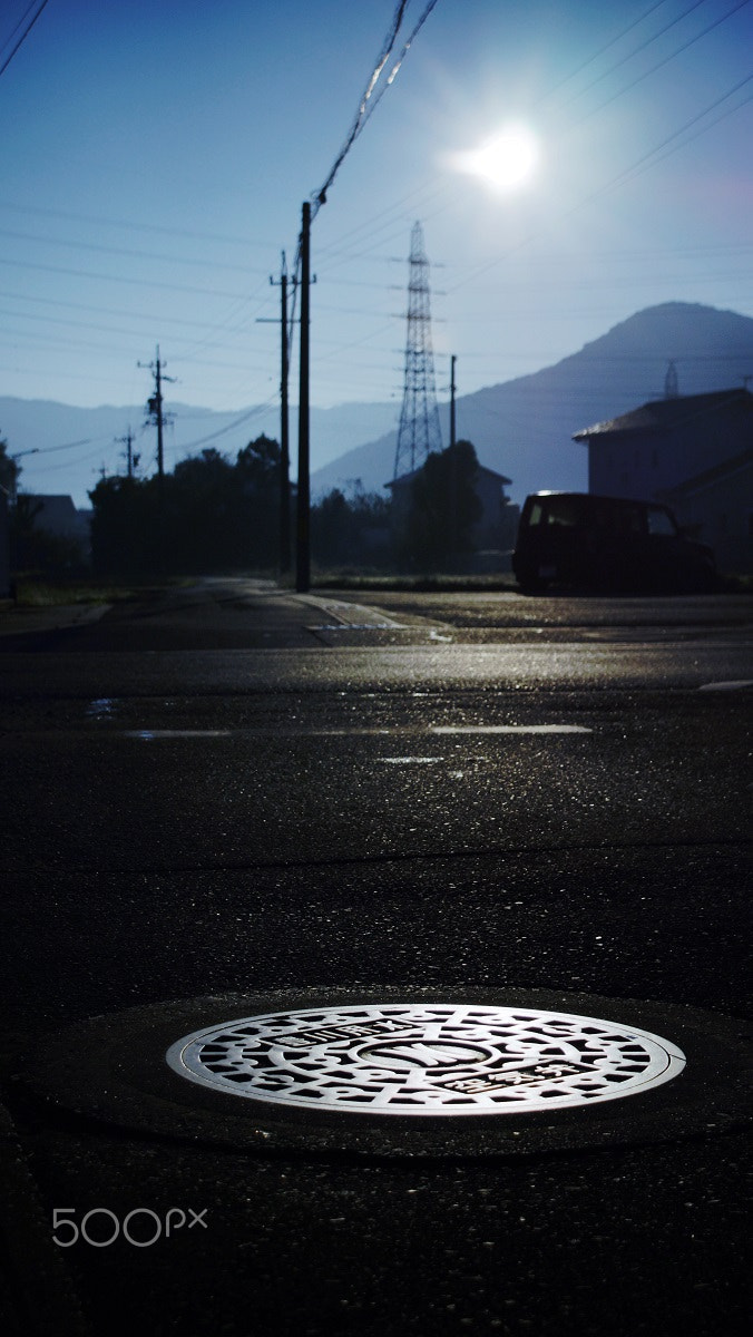 Sony DT 18-70mm F3.5-5.6 sample photo. Manhole photography