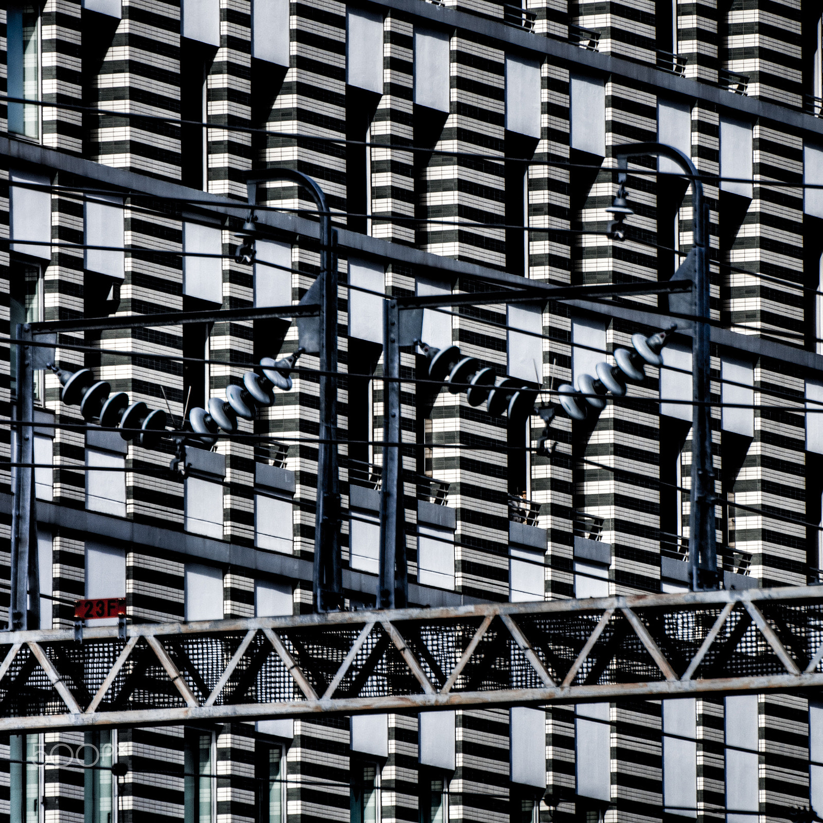 Tamron SP 70-300mm F4-5.6 Di USD sample photo. Camouflaged power line photography