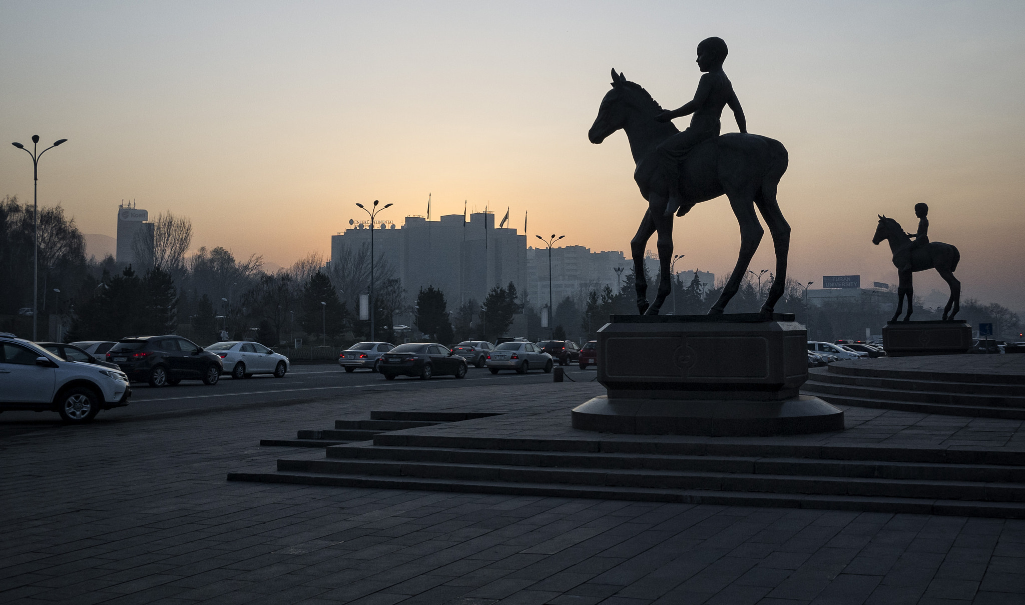 Panasonic Lumix DMC-GF3 + Panasonic Lumix G 20mm F1.7 ASPH sample photo. Riders in the dusk photography