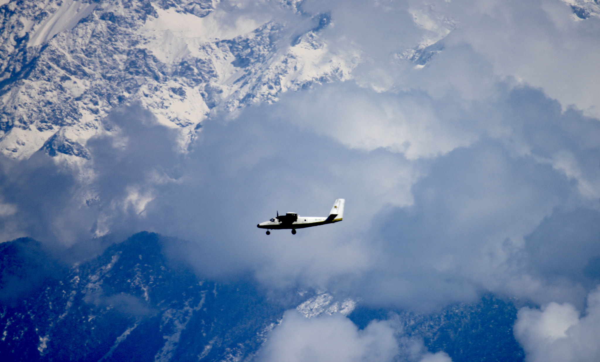 Canon EF 100-400mm F4.5-5.6L IS USM sample photo. Plane in clouds.jpg photography