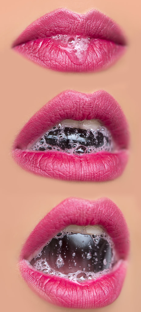 Collage of female lips with a bubble of saliva by Volodymyr Tverdokhlib on 500px.com