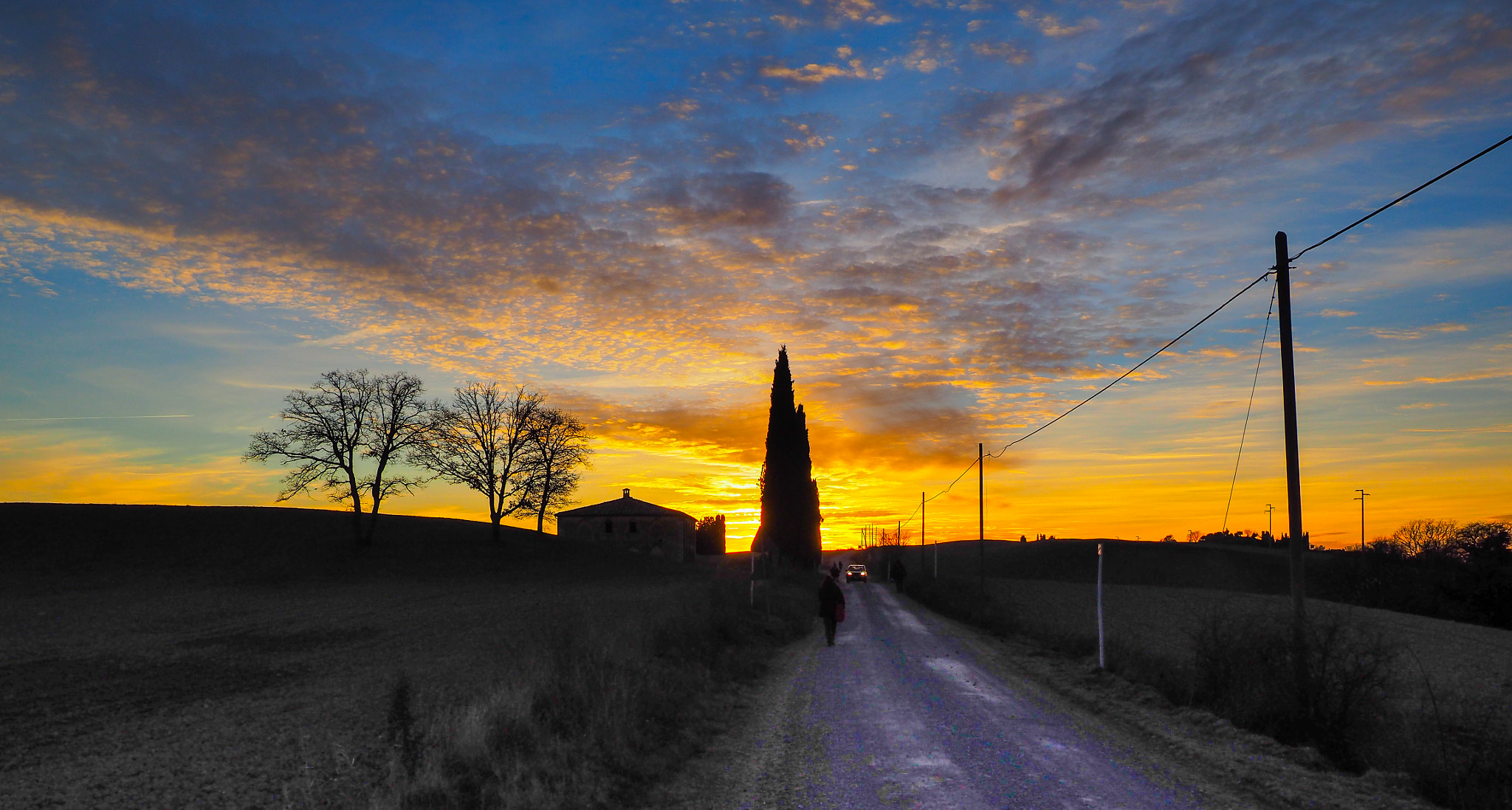 LUMIX G VARIO PZ 14-42/F3.5-5.6 sample photo. White road at sunset photography