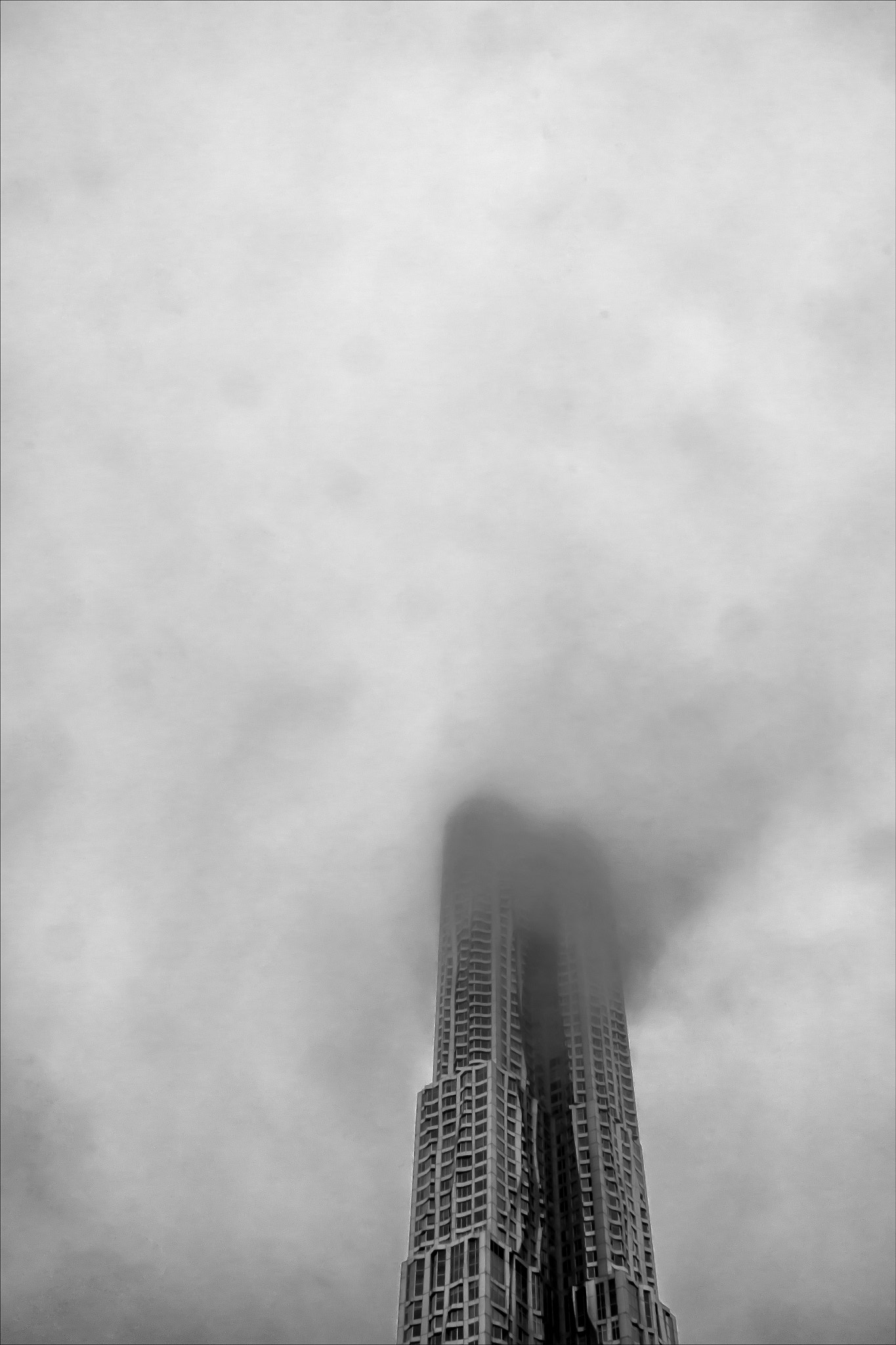 Canon EF 20mm F2.8 USM sample photo. Frank gehry highrise and clouds photography