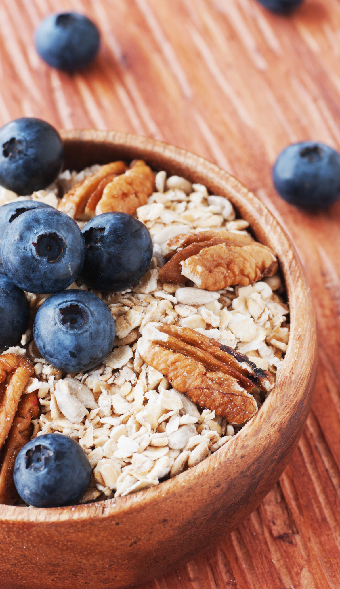 Sony Alpha DSLR-A380 + Sigma 70mm F2.8 EX DG Macro sample photo. Oat meal with walnuts and blueberries selective focus photography