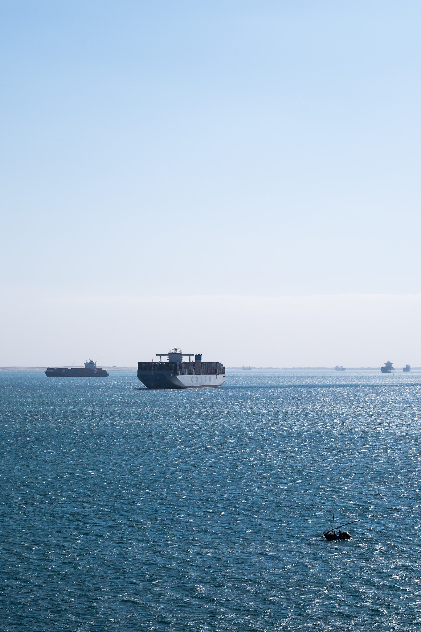 Fujifilm X-E2 + Fujifilm XF 50-140mm F2.8 R LM OIS WR sample photo. Suez canal commerce photography