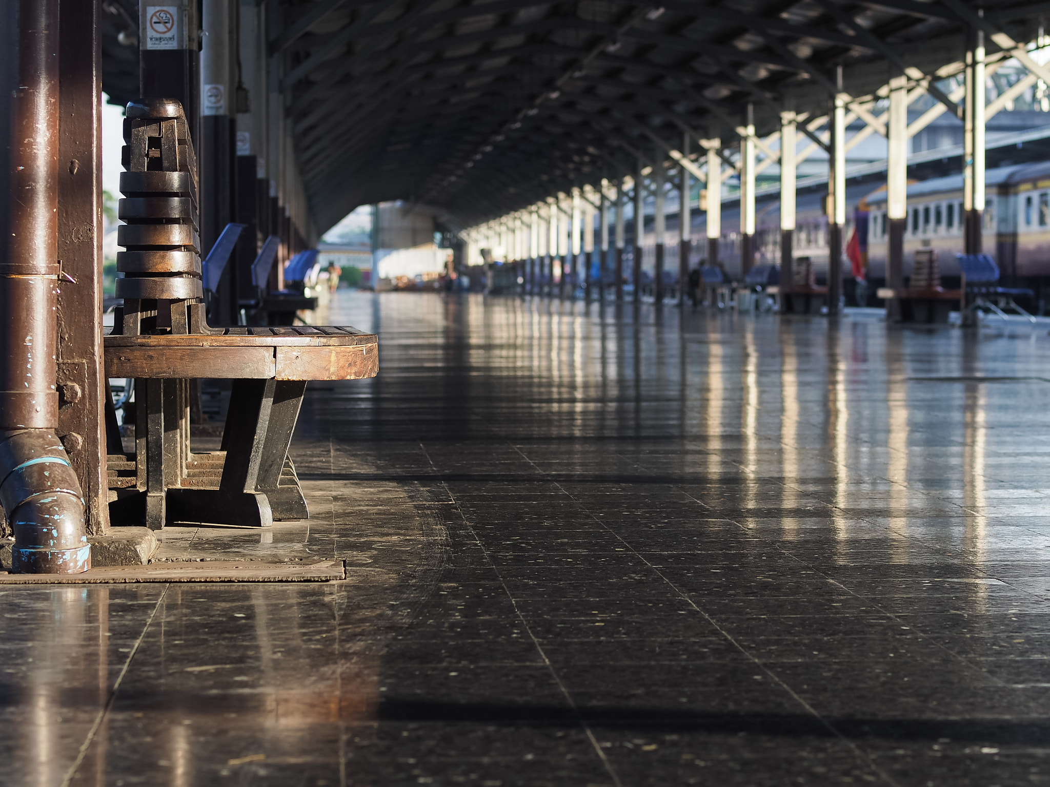 Olympus PEN E-P5 + OLYMPUS 50mm Lens sample photo. Chair of train station photography